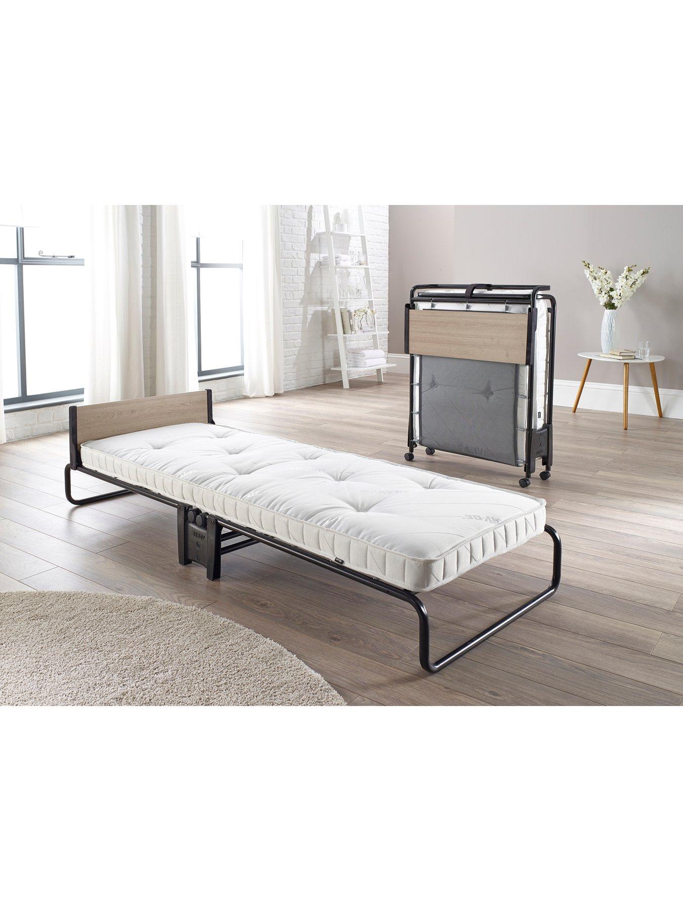 Double folding bed store with mattress