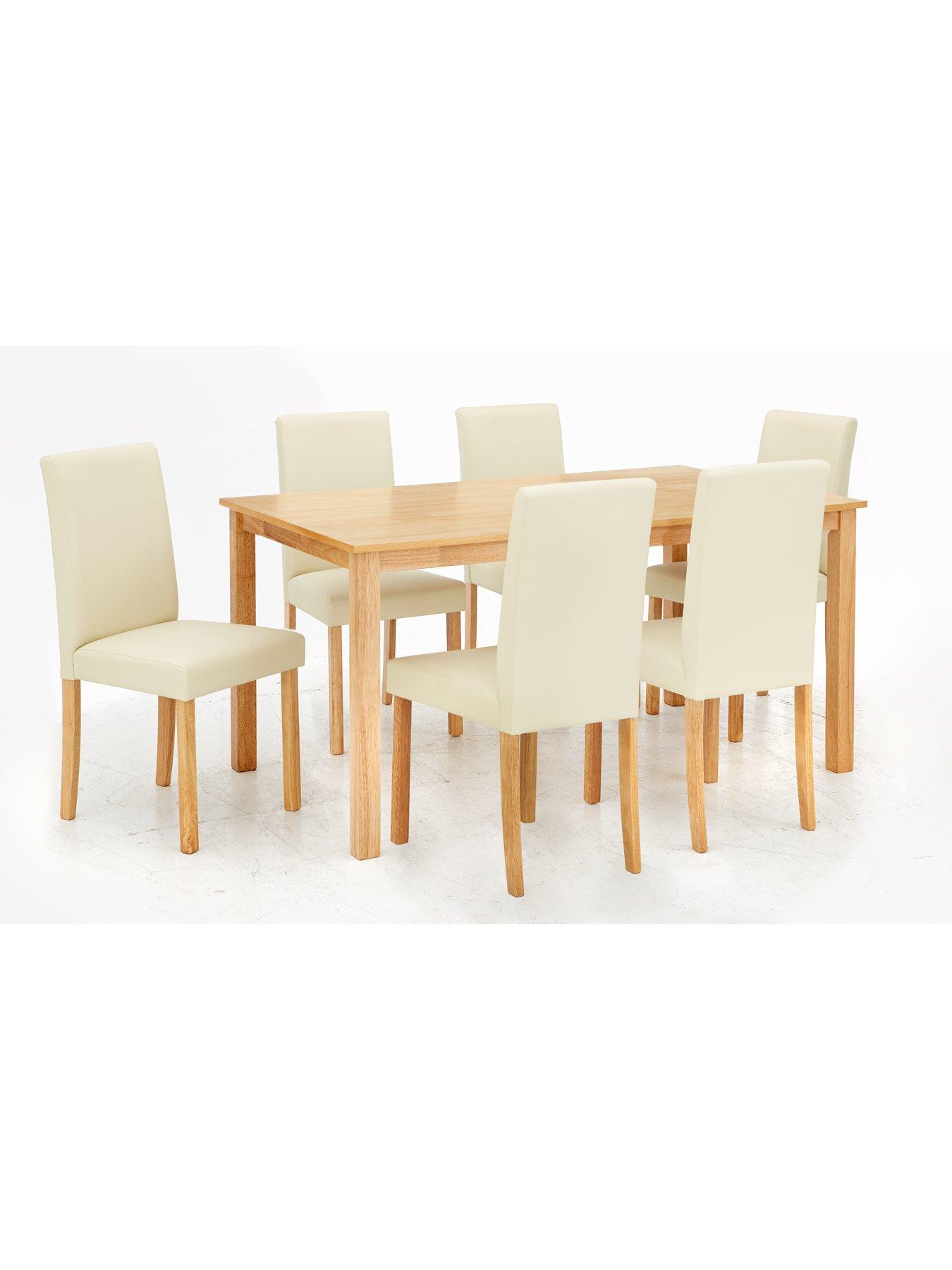 Dining table and 4 2024 faux leather chairs