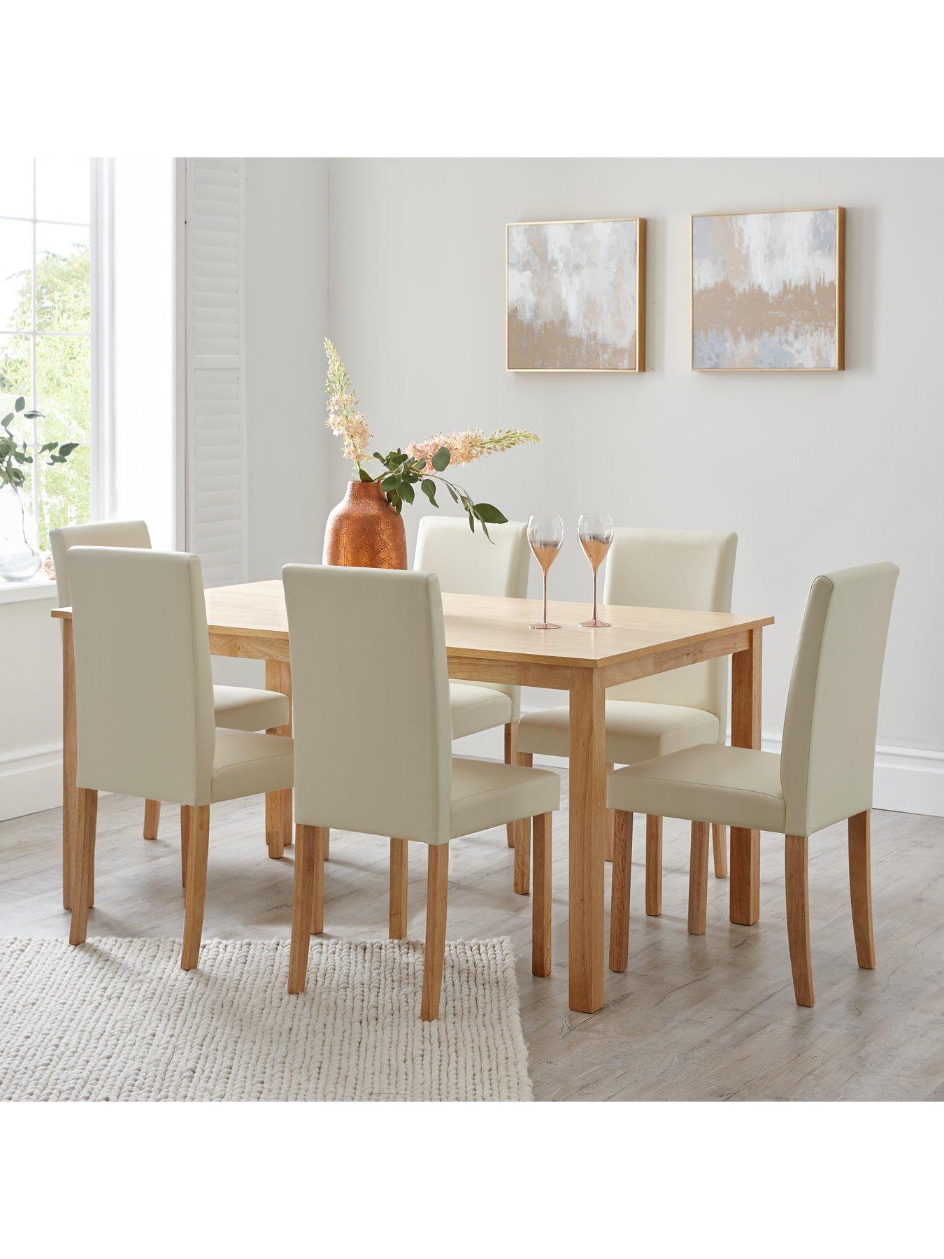 Oak table and 6 deals chairs for sale