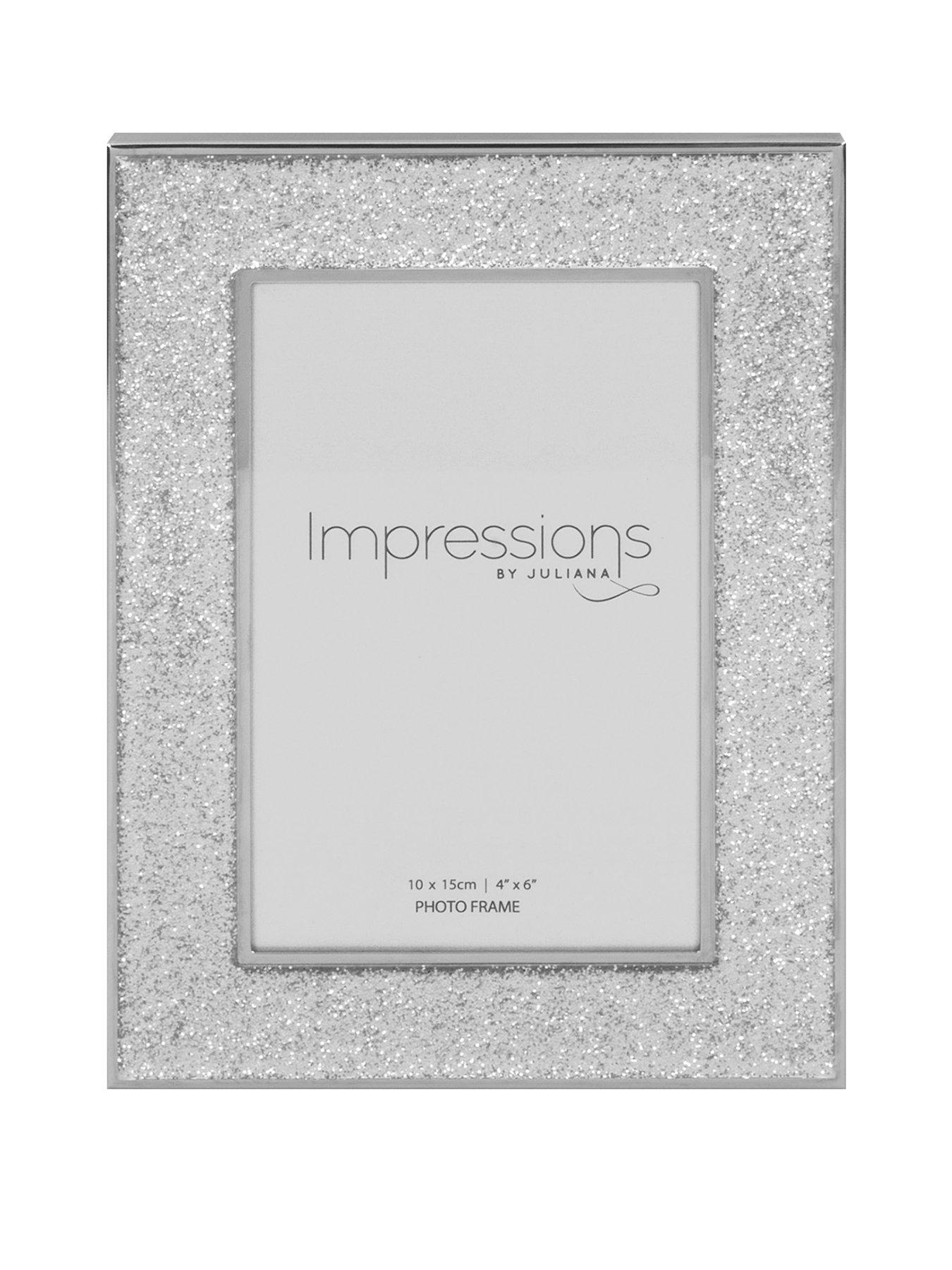 https://media.very.ie/i/littlewoodsireland/LRAPU_SQ1_0000000035_SILVER_SLf/hestia-silver-plated-glitter-photo-frame.jpg?$180x240_retinamobilex2$&$roundel_lwireland$&p1_img=vgp_pink