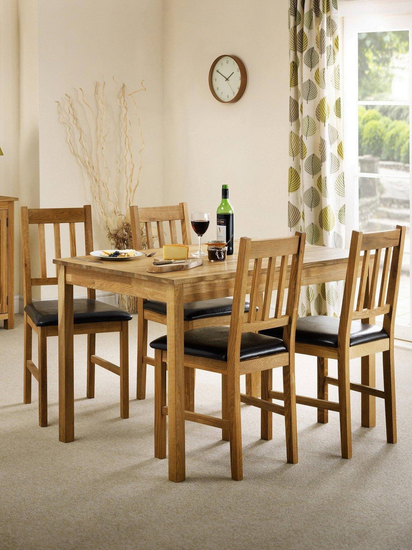 julian-bowen-coxmoor-118-cm-solid-oak-dining-table-4-chairsfront