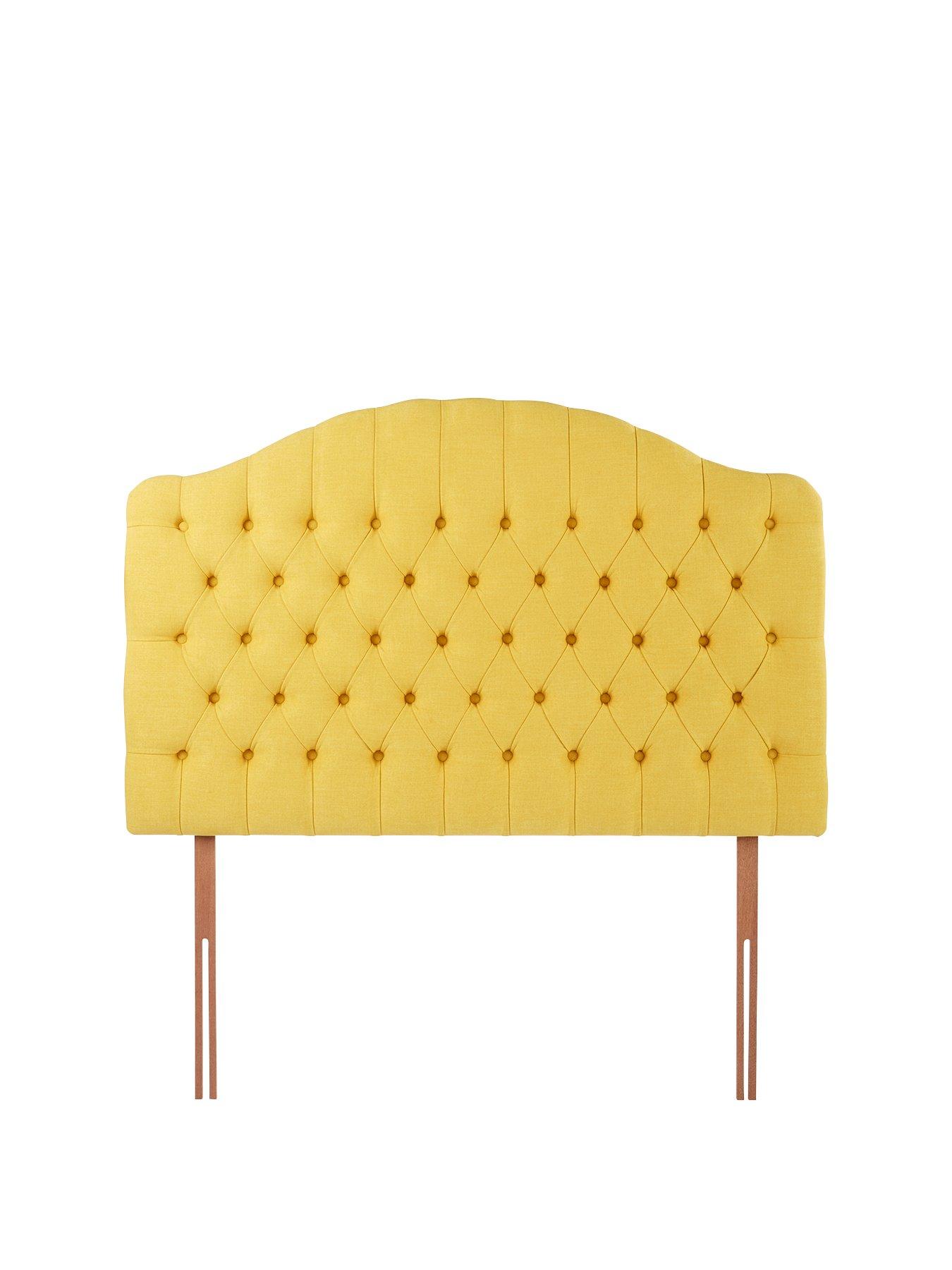 Yellow fabric store headboard