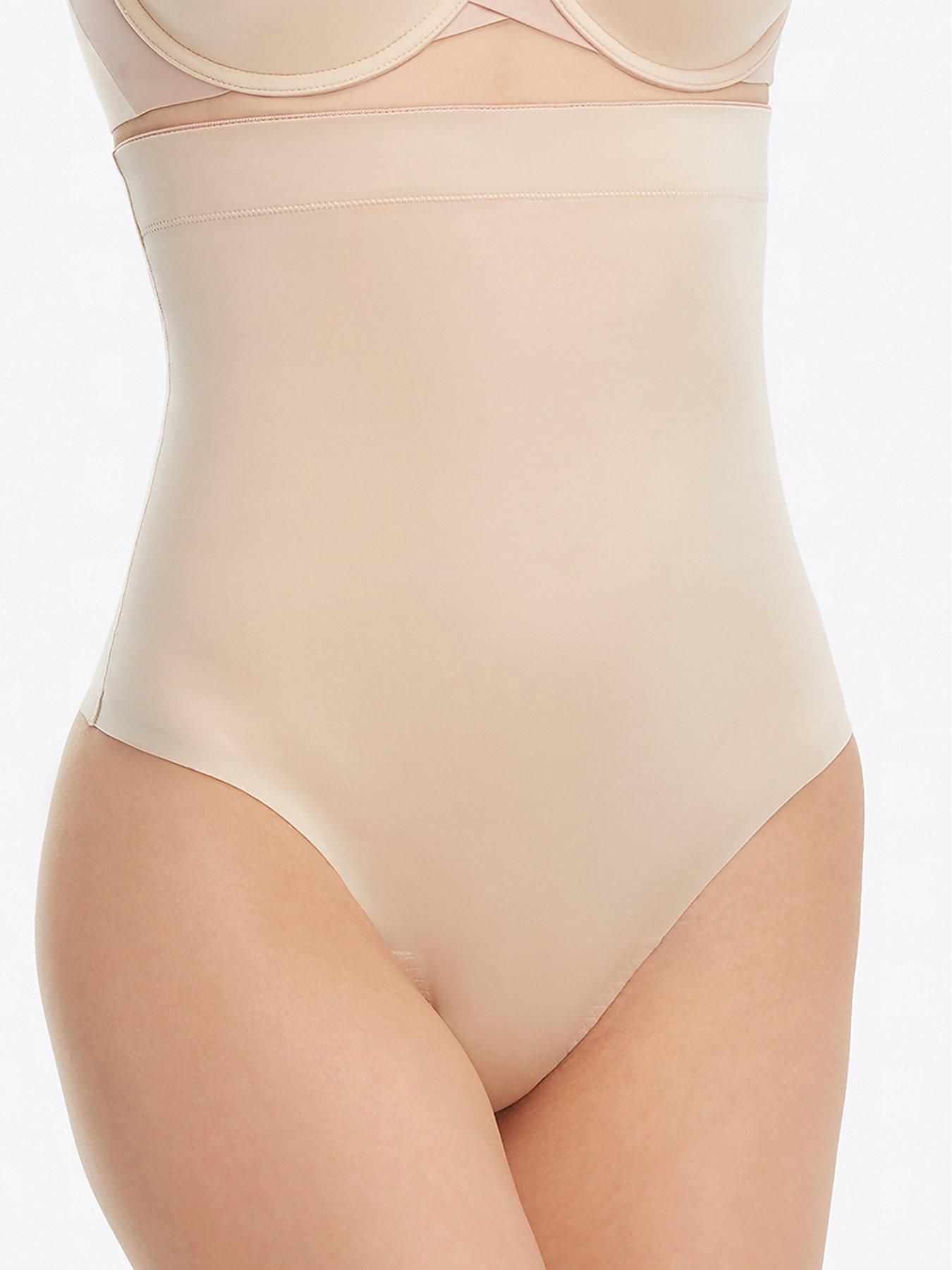 SPANX suit me fancy thong shaper .Small nude