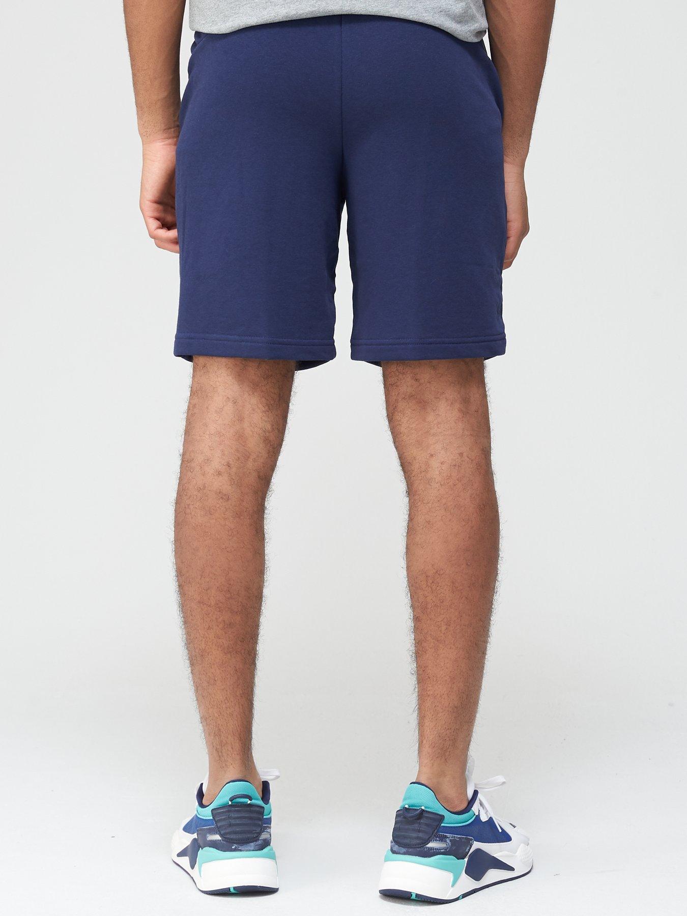 puma-mens-essentials-shorts-10-navystillFront