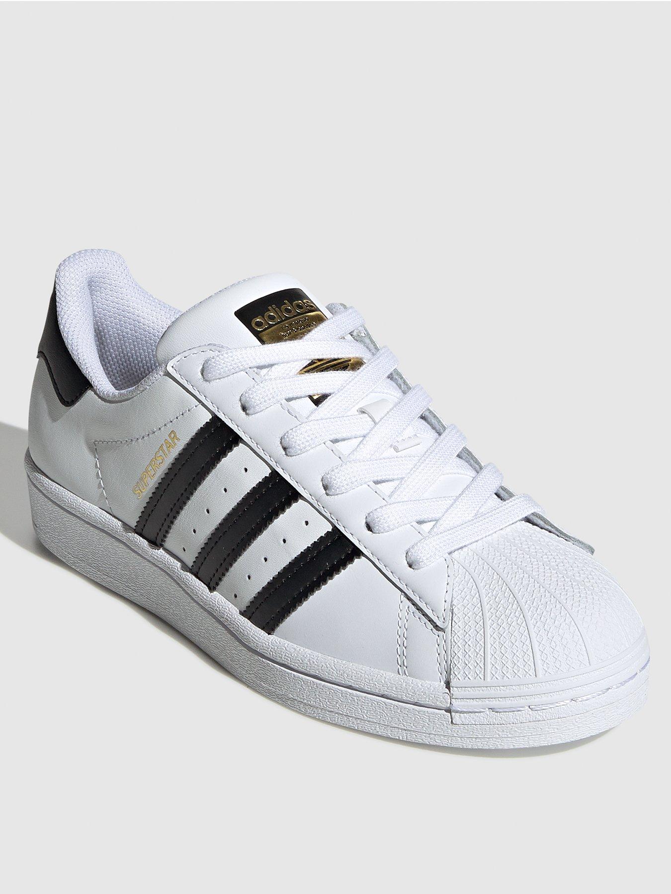 Adidas superstar junior 2025 black and white