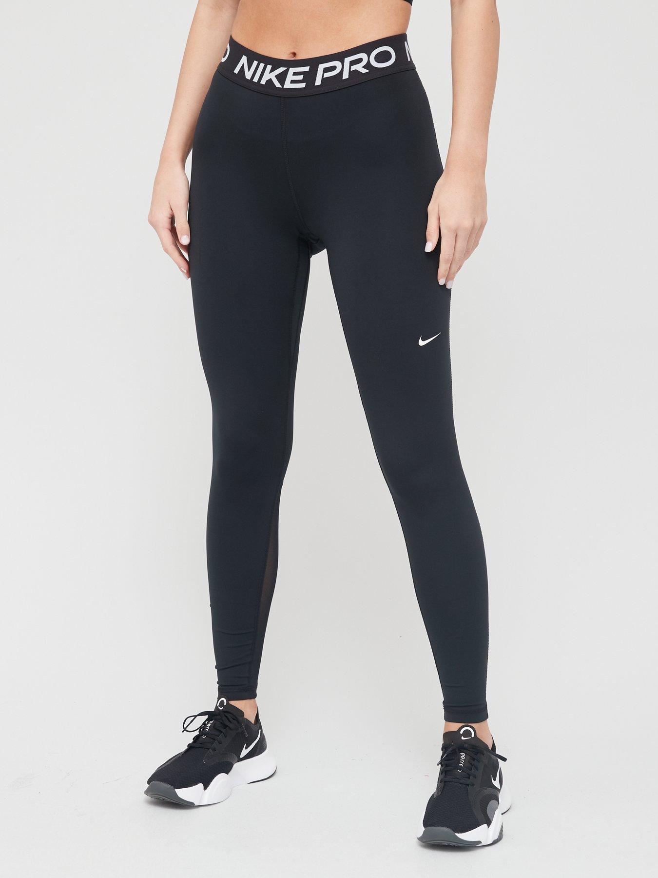 Nike Pro Training swoosh bra and leggings in navy and rose gold
