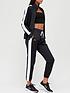 under-armour-womens-tricot-tracksuit-blackwhitefront