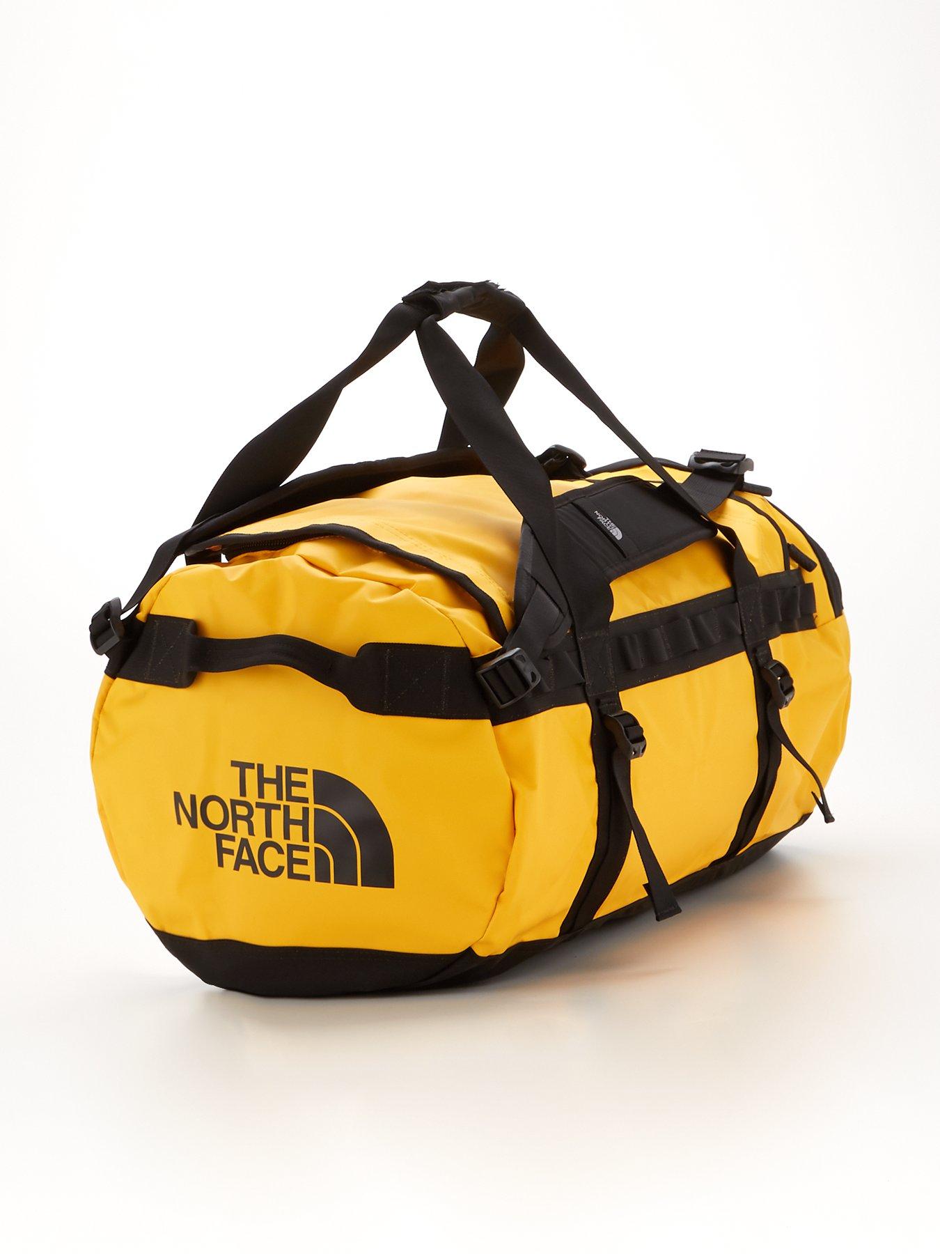 North face store duffel yellow