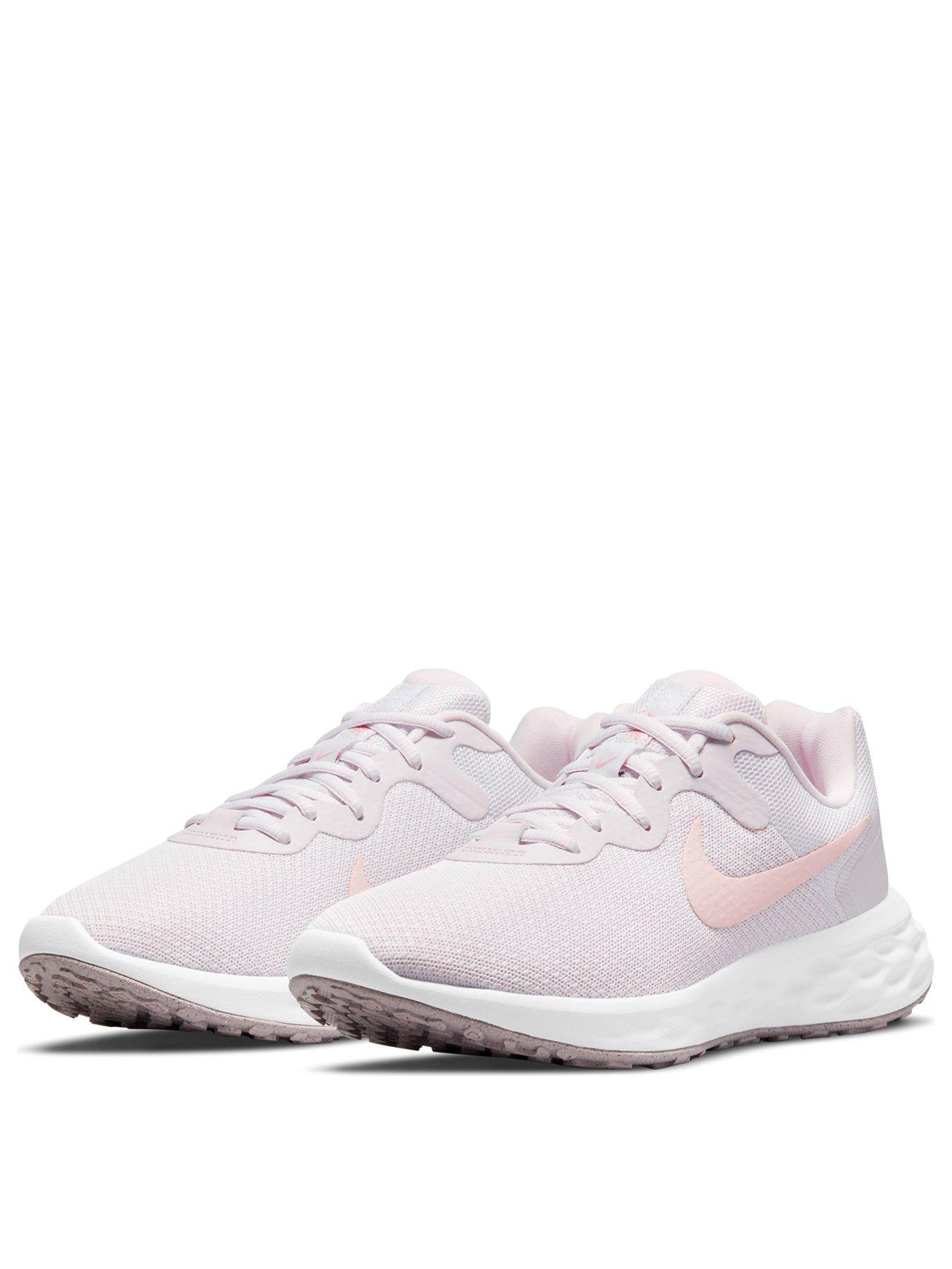 Pink and white store nike trainers