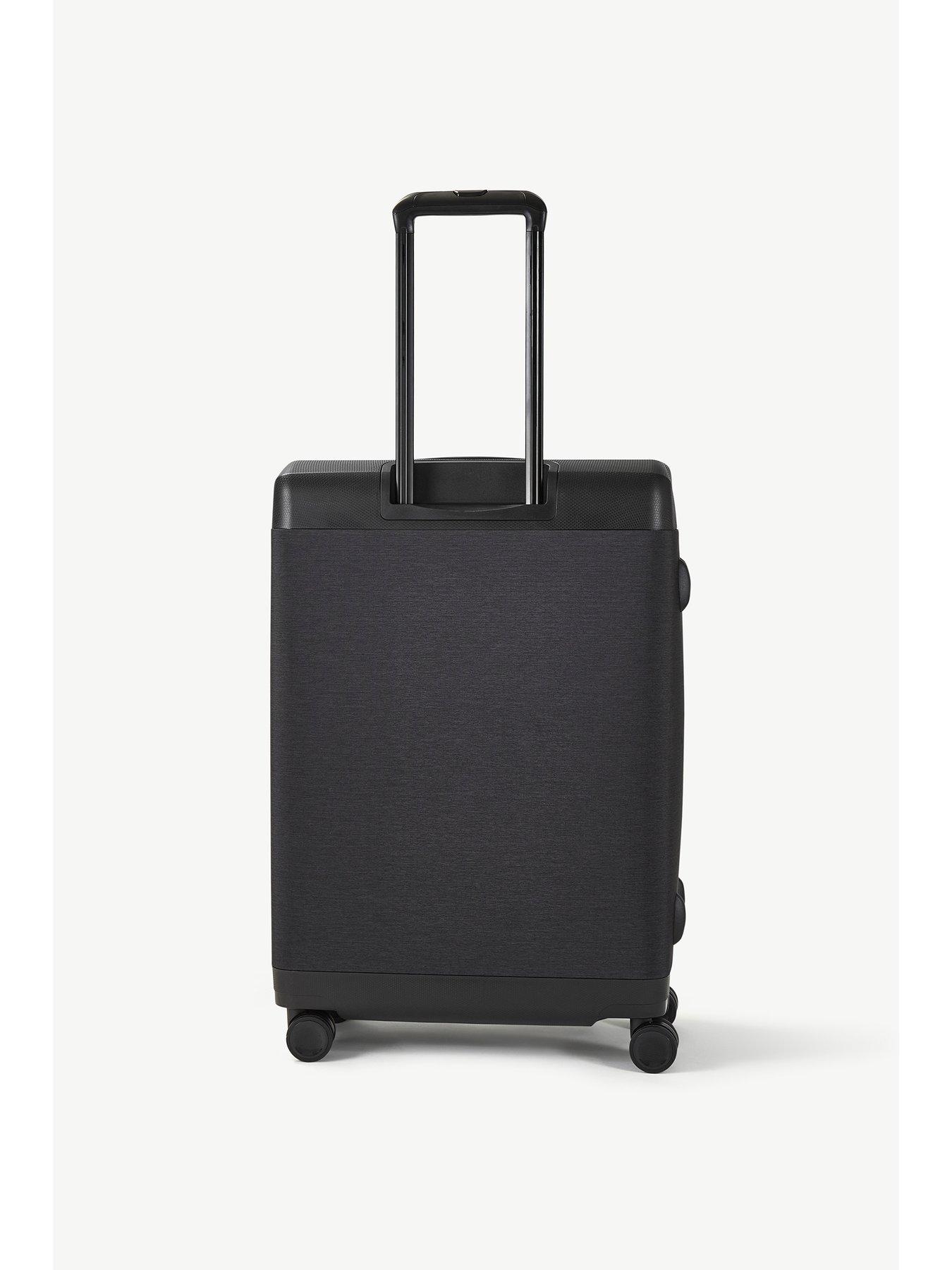 rock-luggage-parker-8-wheel-suitcase-medium-blackoutfit