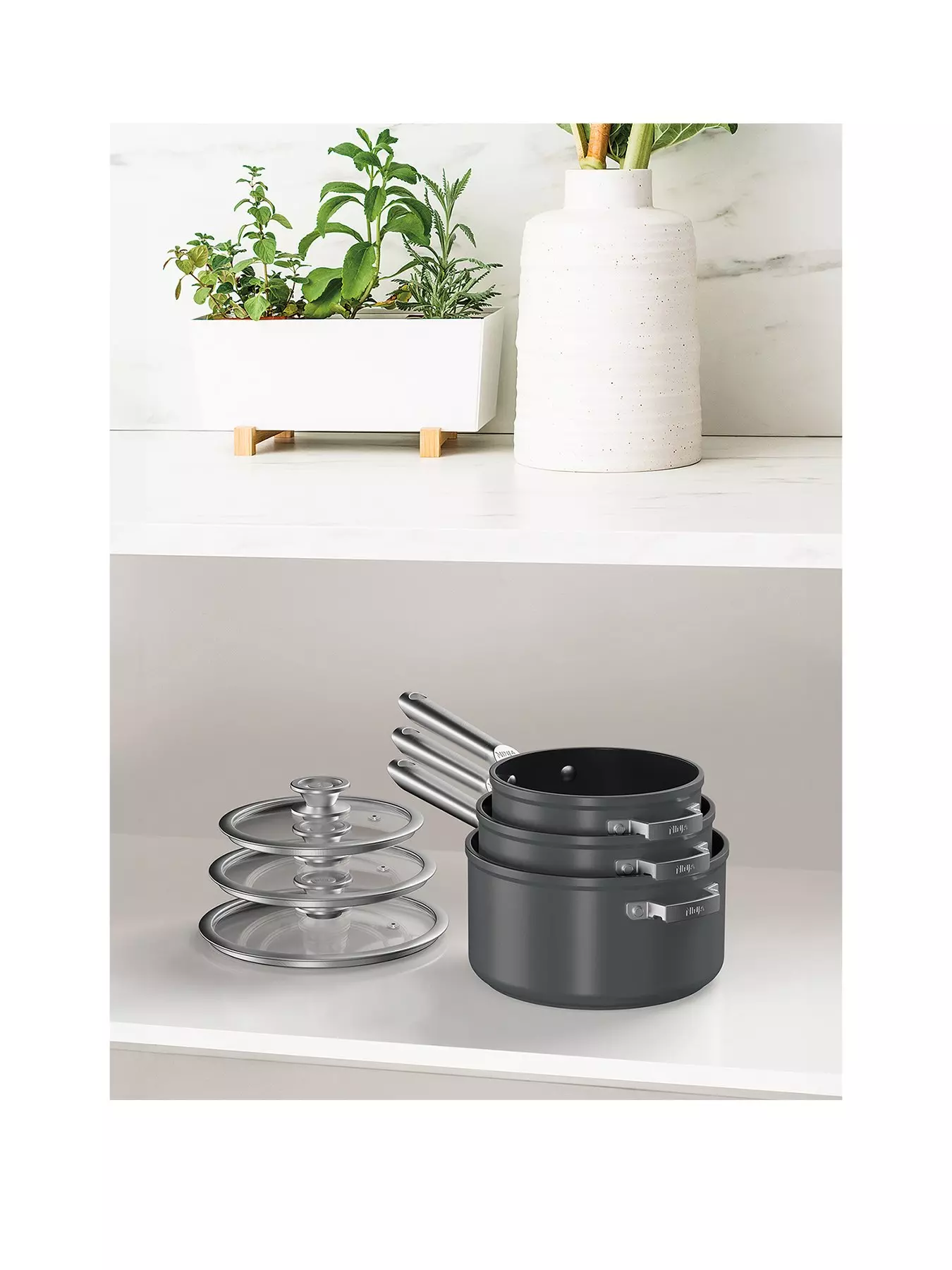 https://media.very.ie/i/littlewoodsireland/UAFYL_SQ1_0000000071_CHARCOAL_SLf/ninja-foodi-zerostick-stackable-3-piece-set-161820cm-saucepans-non-stick-c53000uk.jpg?$234x312_retinax2$&$roundel_lwireland$&p1_img=vgp_pink&fmt=webp