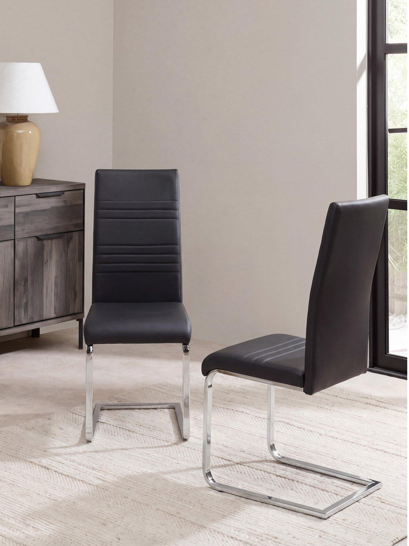the-very-collection-pair-of-jet-faux-leather-cantilever-dining-chairs-black