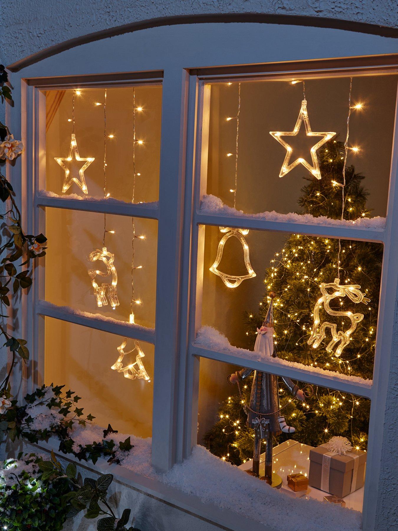 very-home-curtain-window-light-with-christmas-shapes