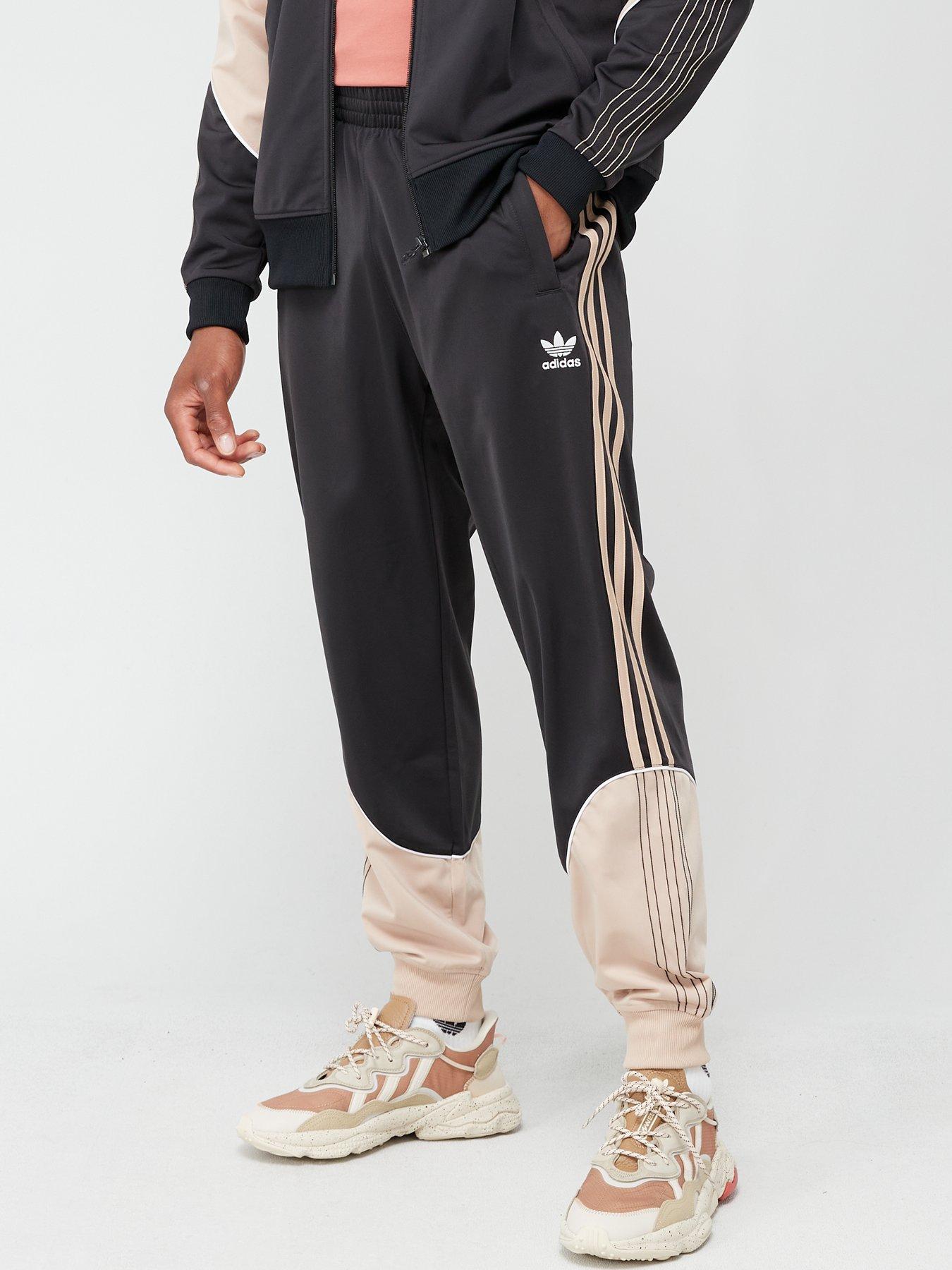 Adidas originals sst on sale track pant black