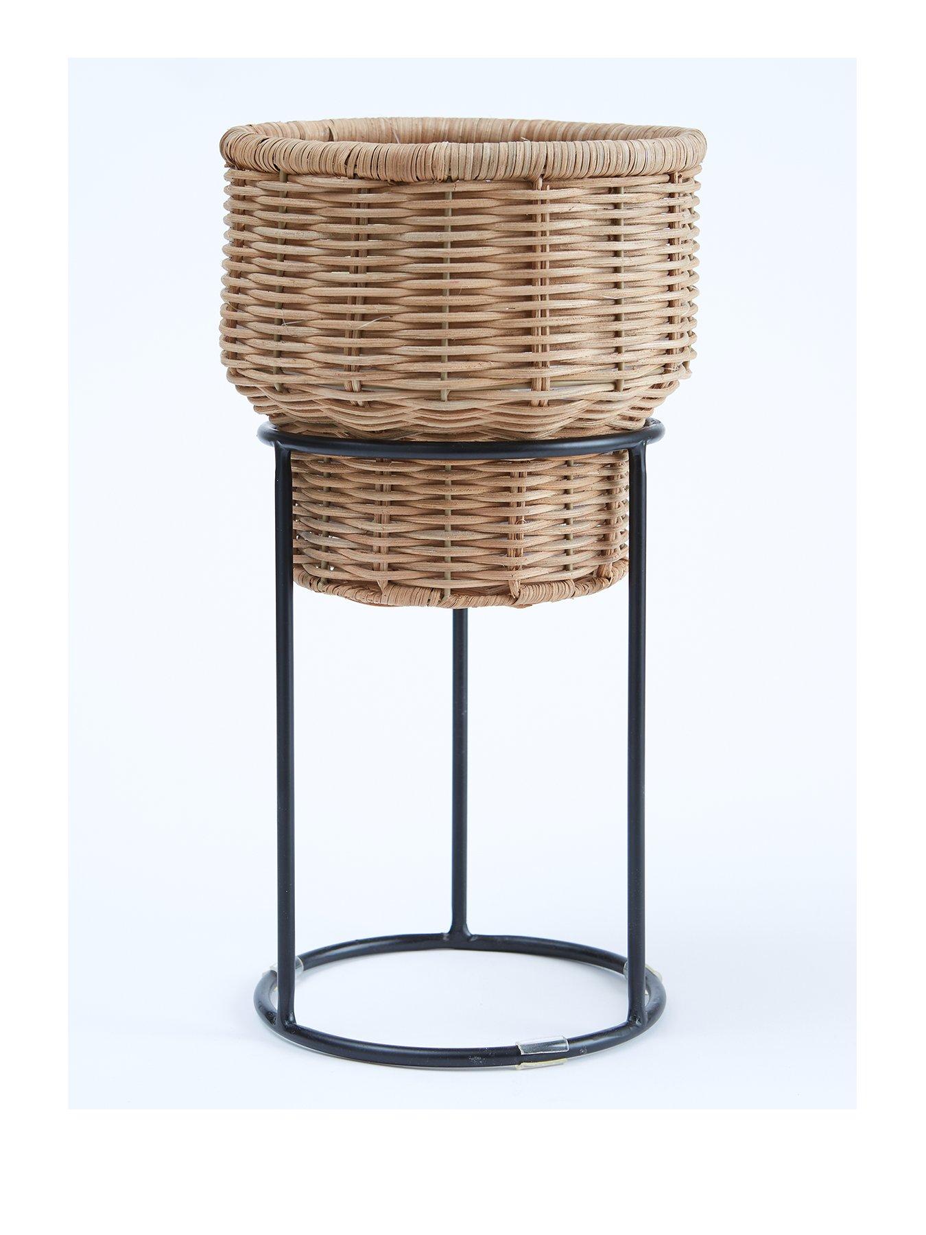 the-very-collection-rattan-planter-on-metal-standstillFront