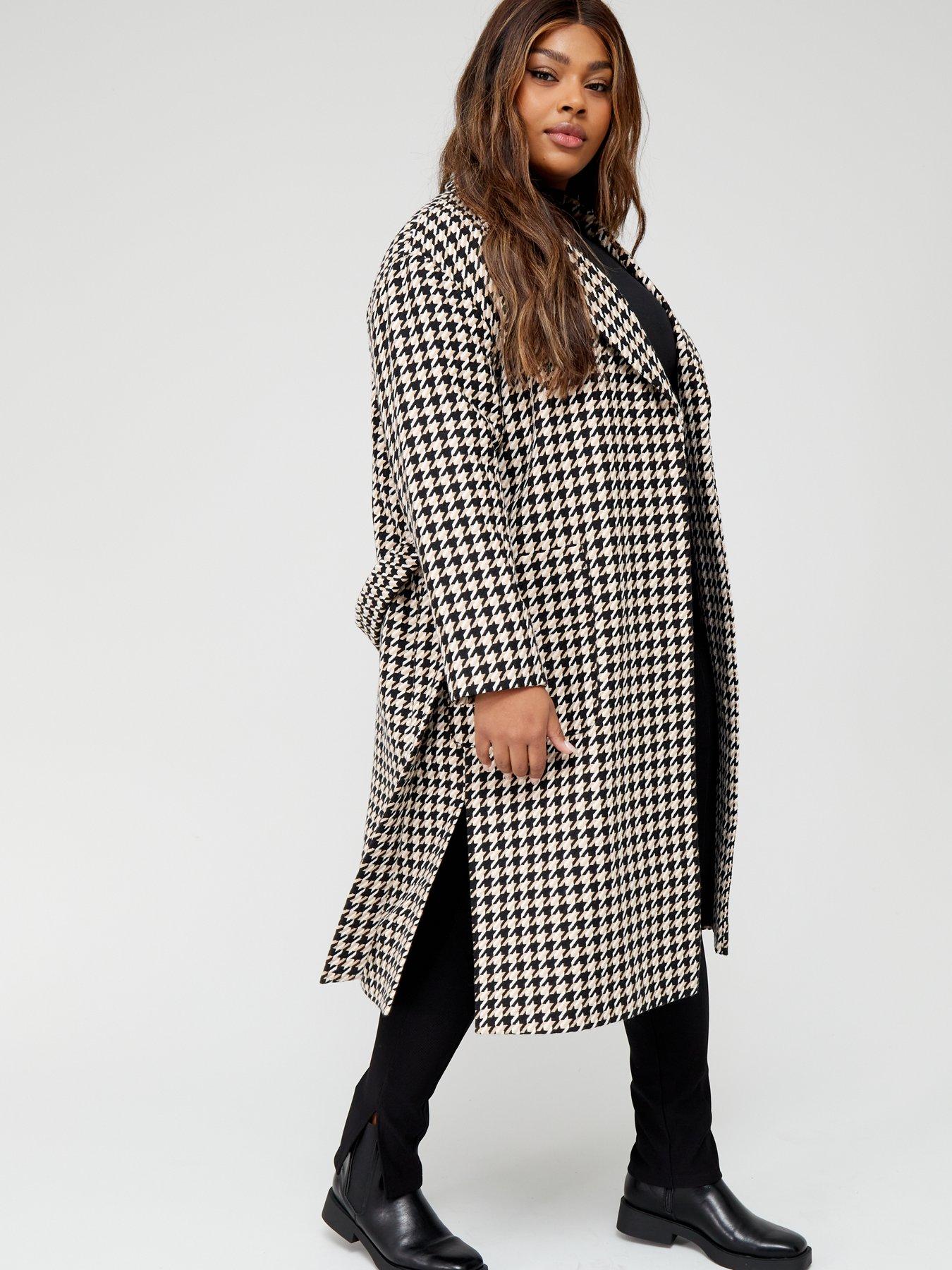 Black and white store houndstooth coat