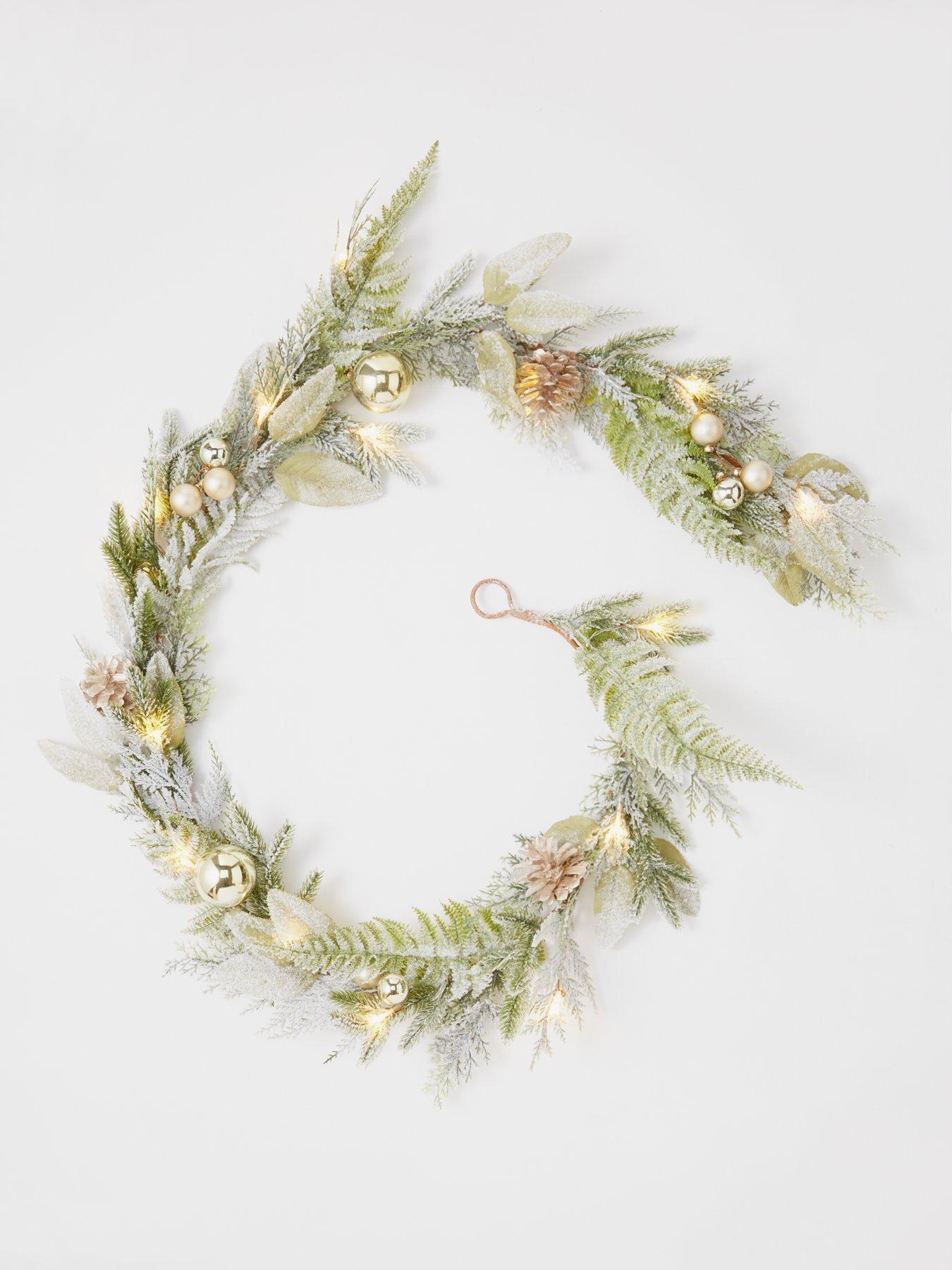 very-home-frosted-pre-lit-christmas-garland-with-baubles-and-pineconesback