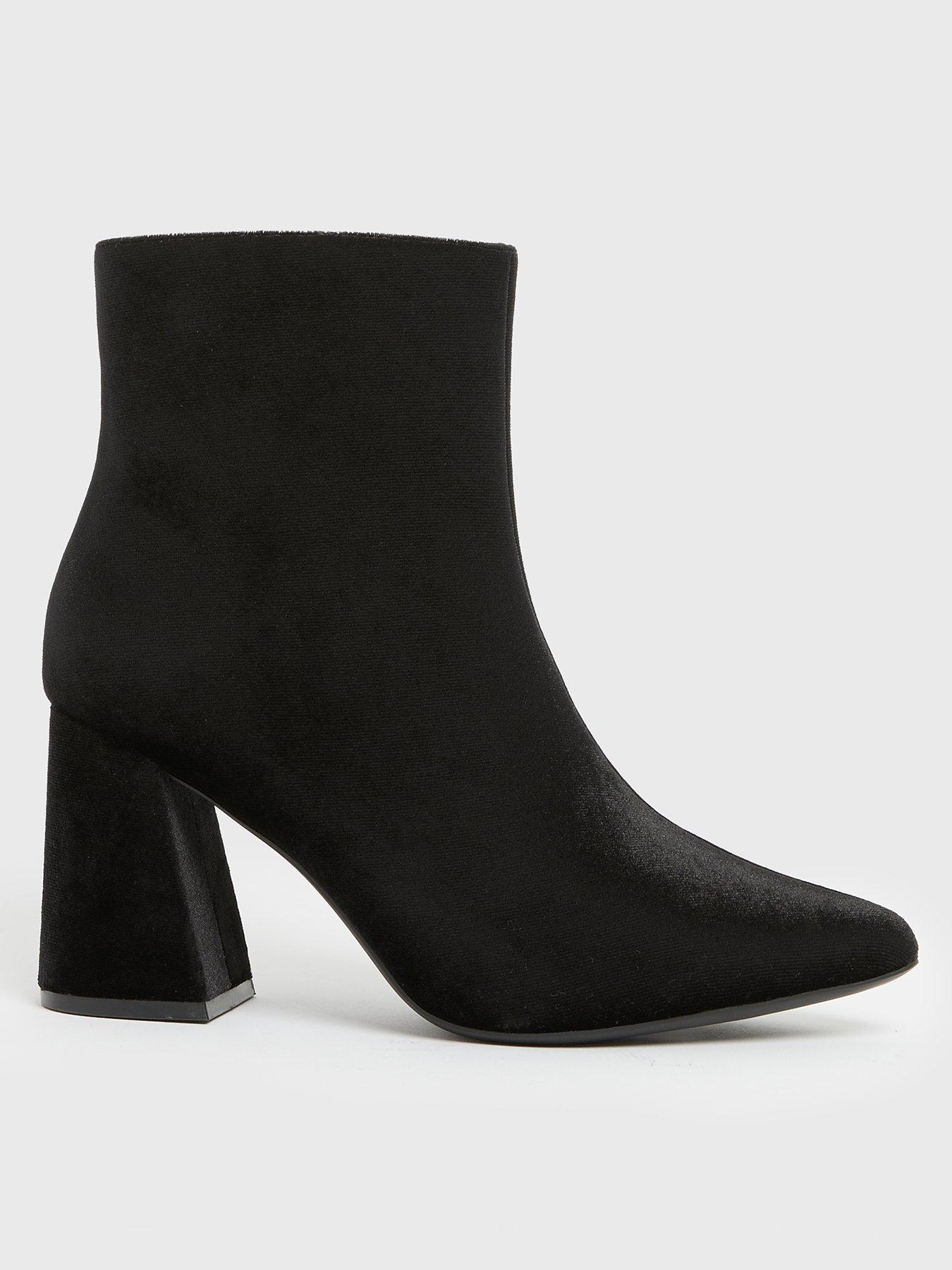 2.5 inch heel black booties