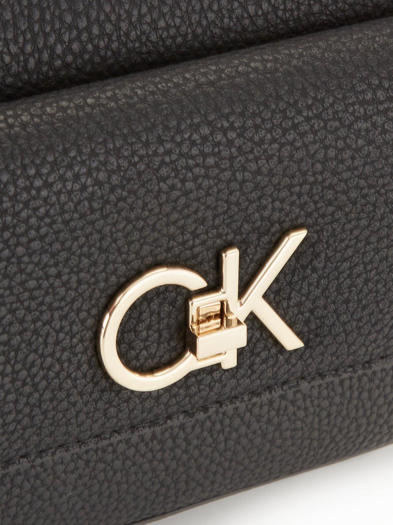 calvin-klein-calvin-klein-re-lock-camera-bag-blackoutfit