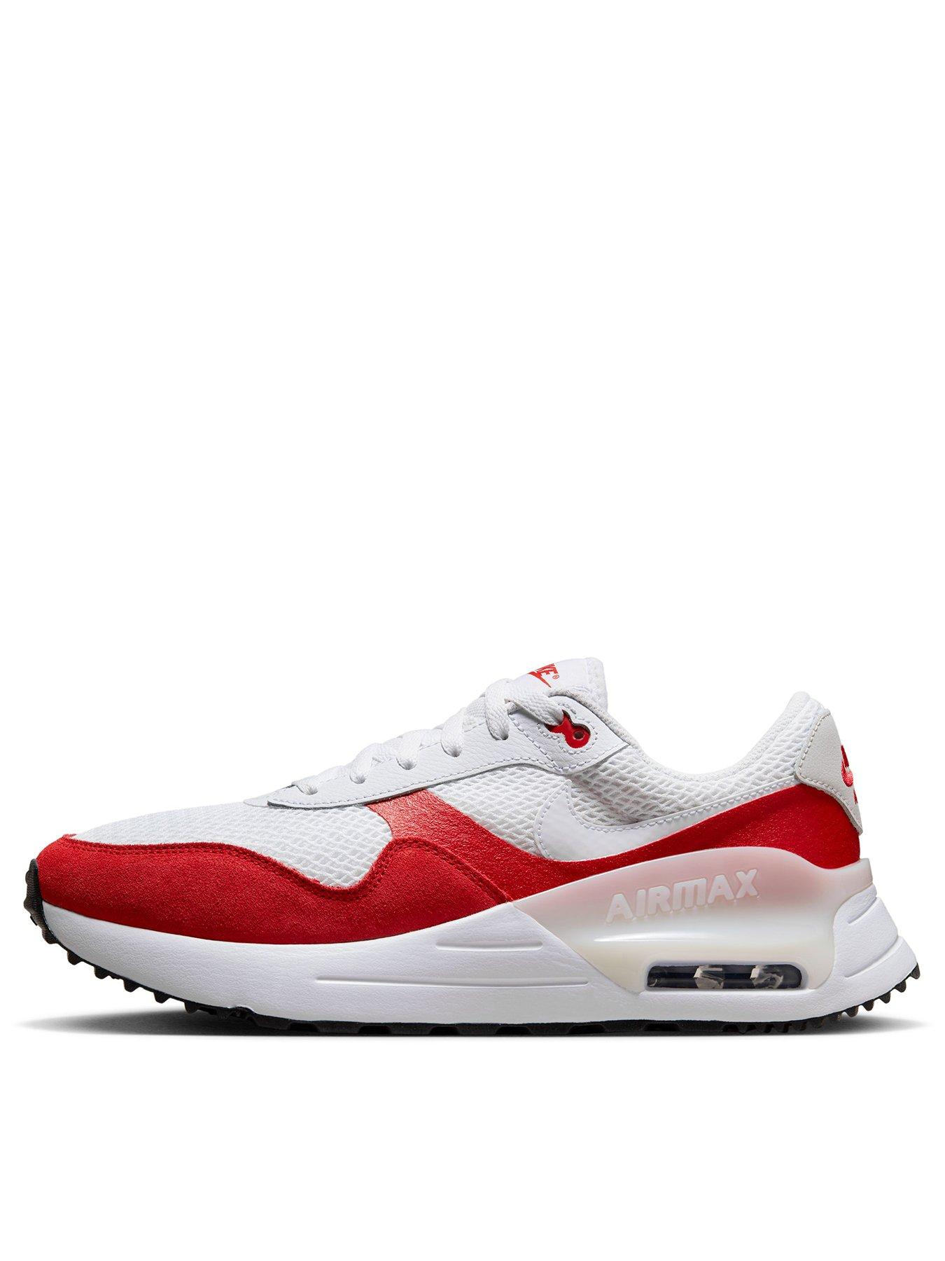 Nike white trainers with cheap red tick