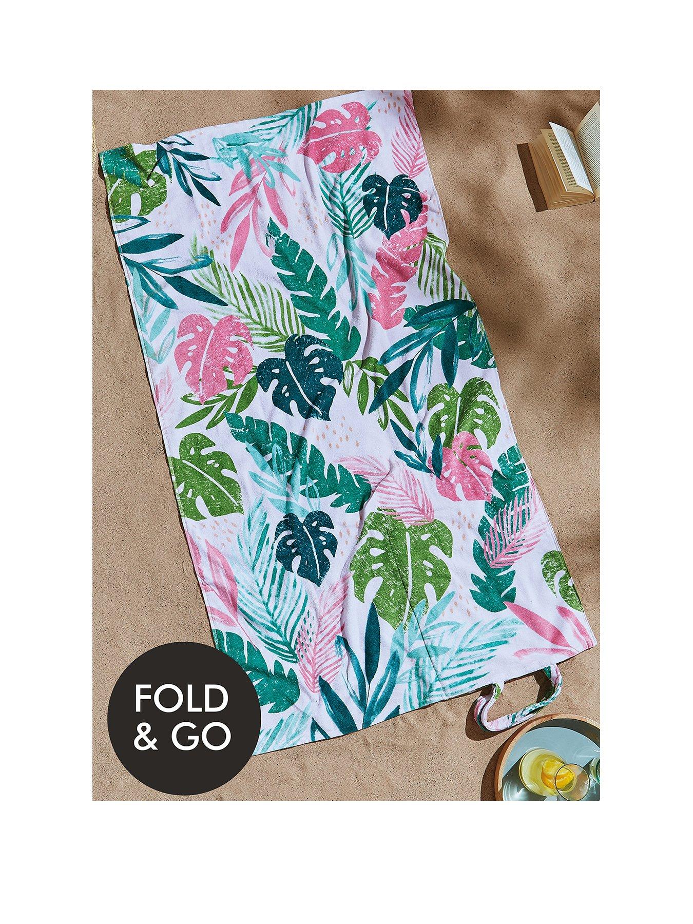 catherine-lansfield-tropic-palms-beach-towel-in-a-bagfront