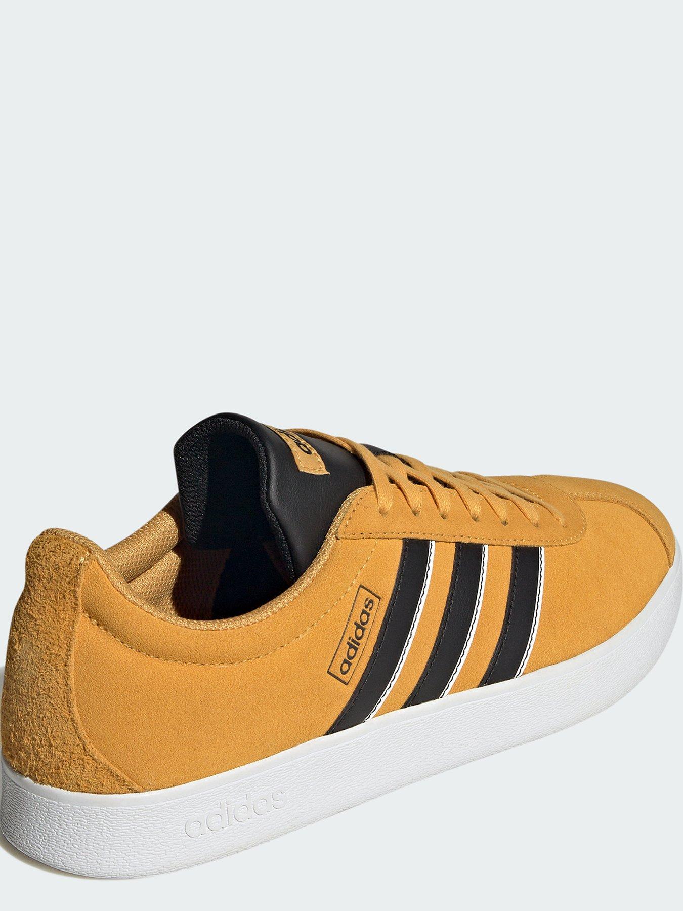 Mens yellow 2025 adidas shoes