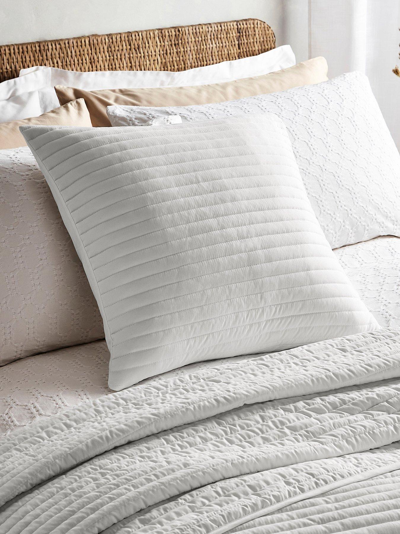 https://media.very.ie/i/littlewoodsireland/VHB10_SQ1_0000000013_WHITE_RSr/bianca-quilted-lines-filled-cushion-in-white.jpg?$180x240_retinamobilex2$