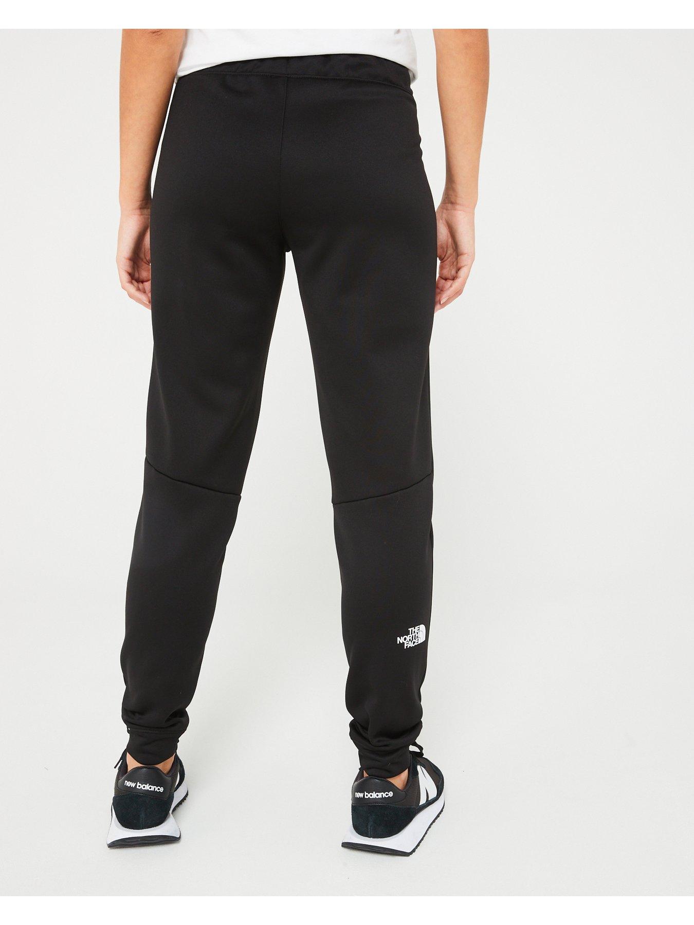 the-north-face-womens-reaxion-fleece-jogger-blackstillFront