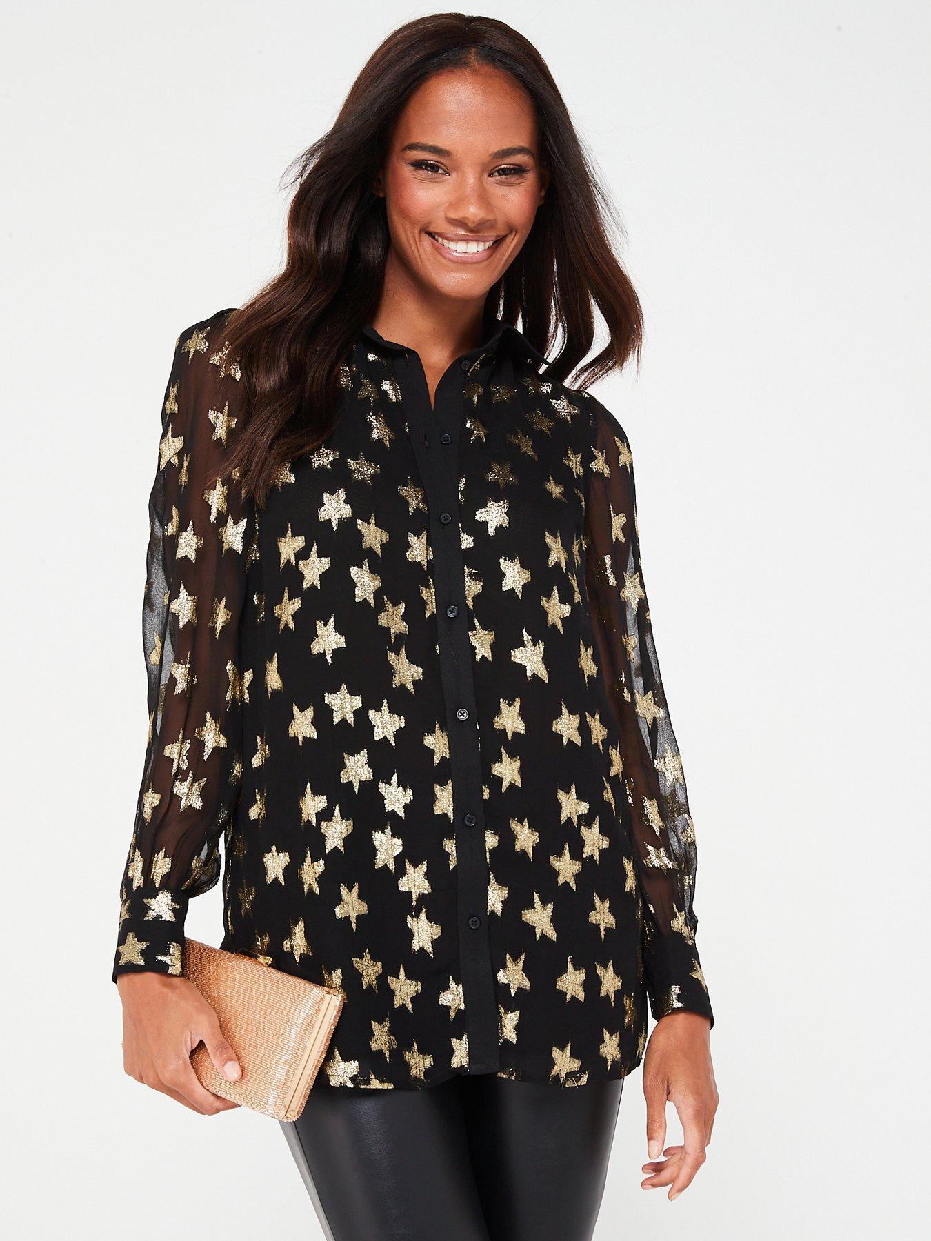 Sheer black store top with stars