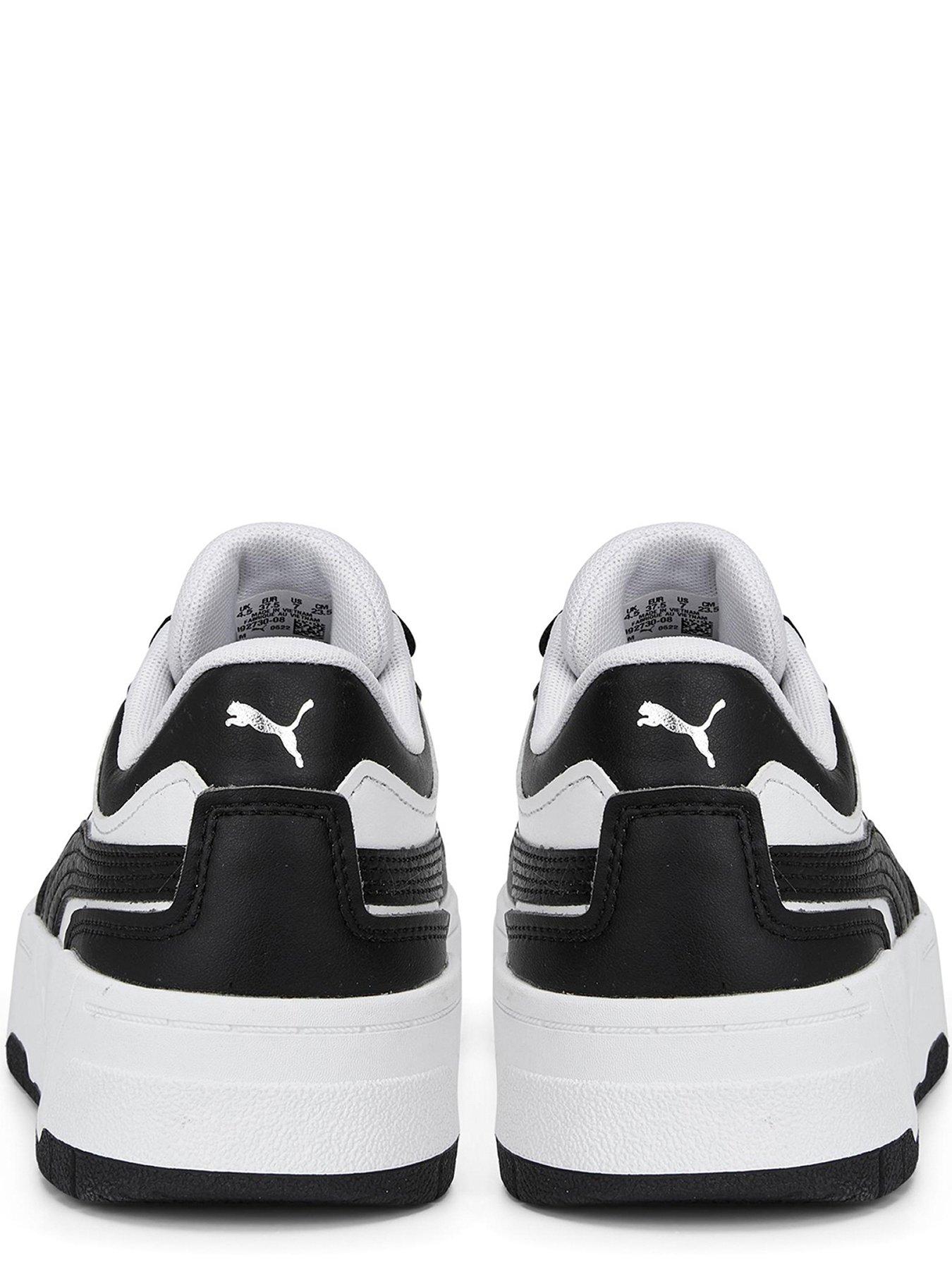 Puma white & on sale black cali leather trainers