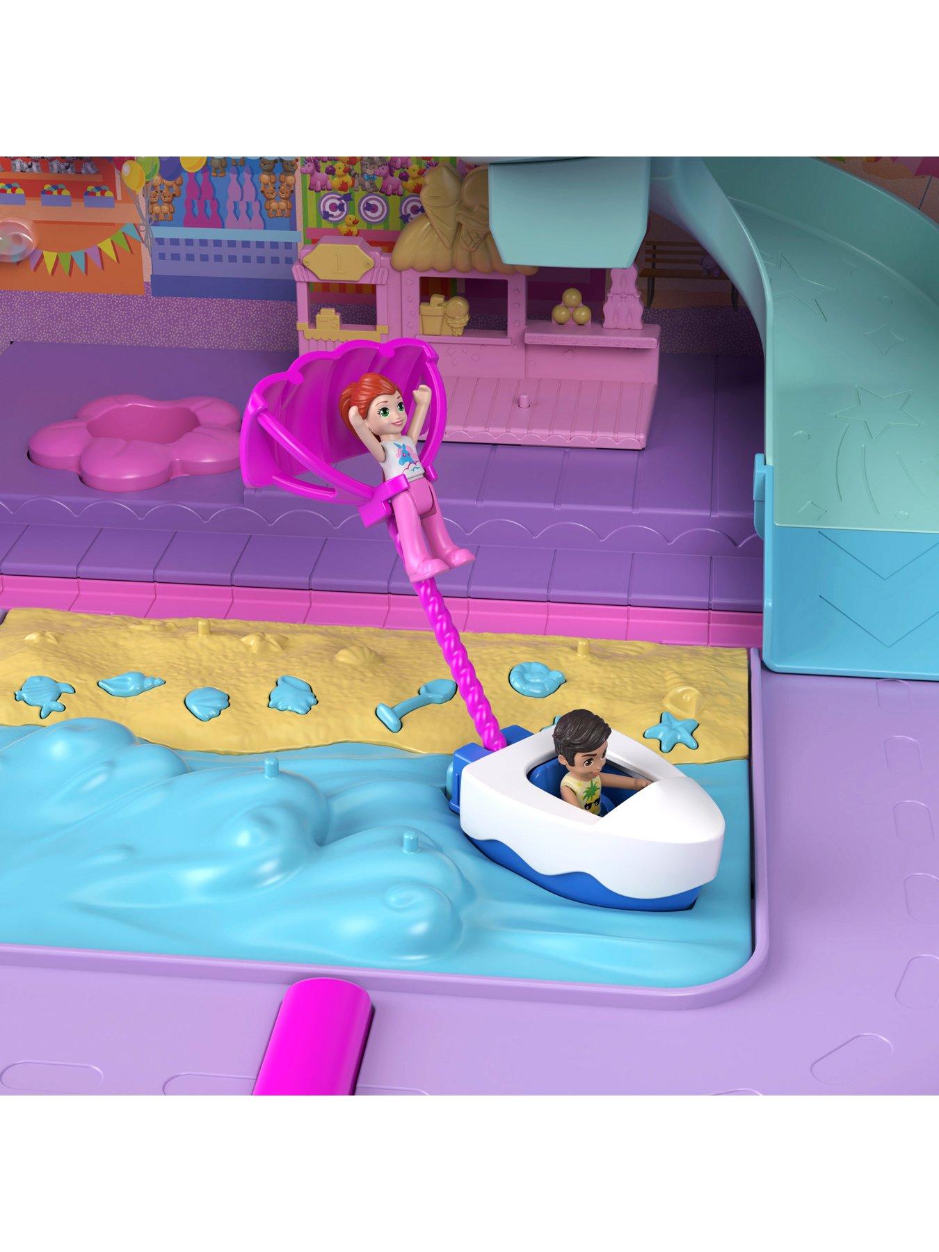 Image 4 of 7 of Polly Pocket Pollyville Resort Roll-Away Suitcase Playset