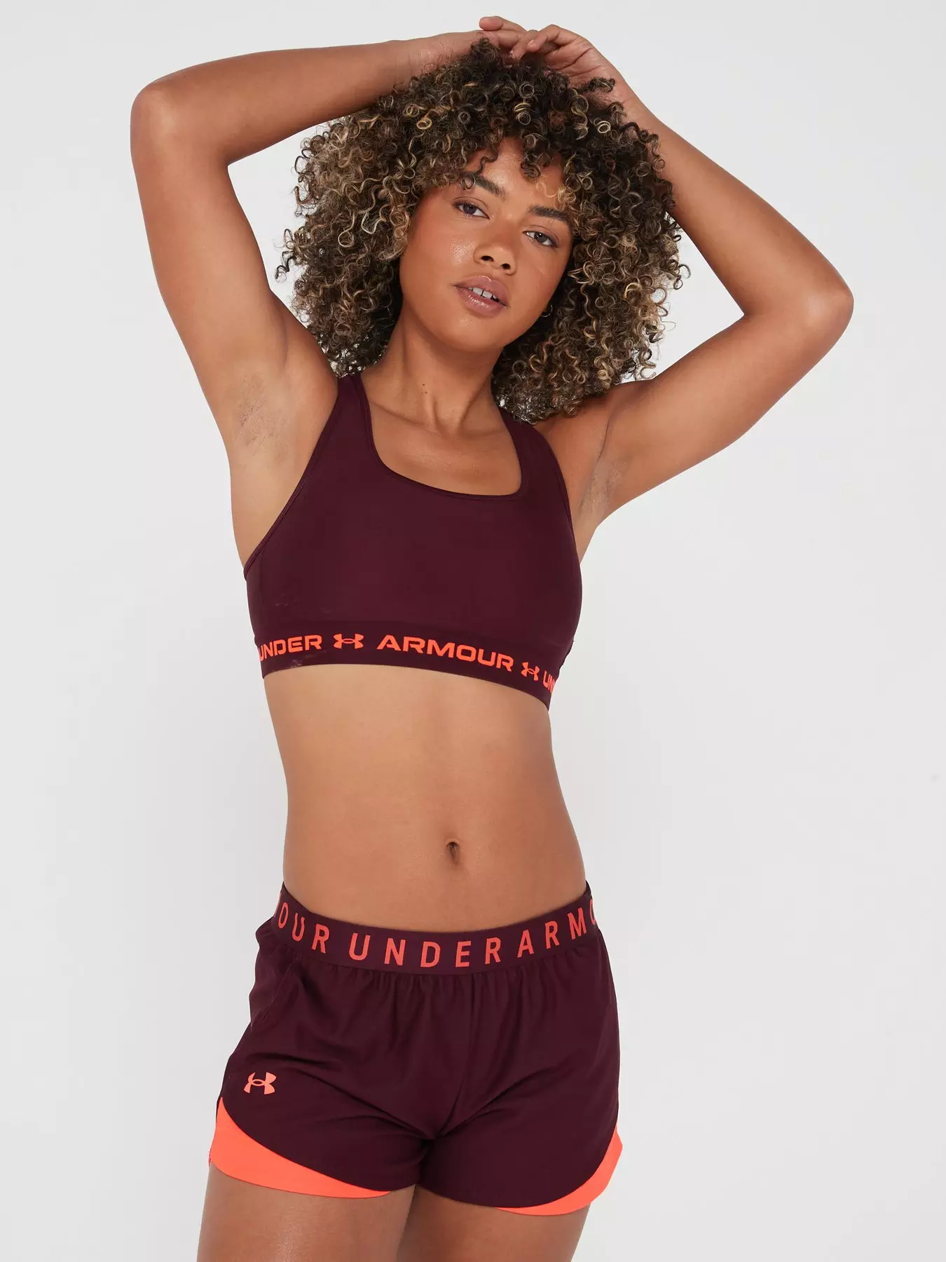 Under Armour Women Armour Mid Keyhole Graphic, Women's Compression Sports  Bra, Running Bra with Racer Back Design and High Shine Logo : :  Fashion