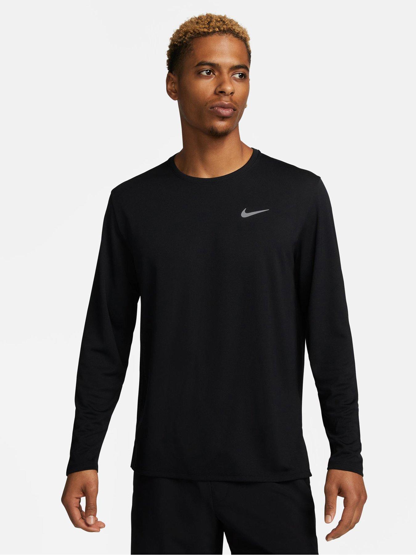 navy blue and neon green nike shirt