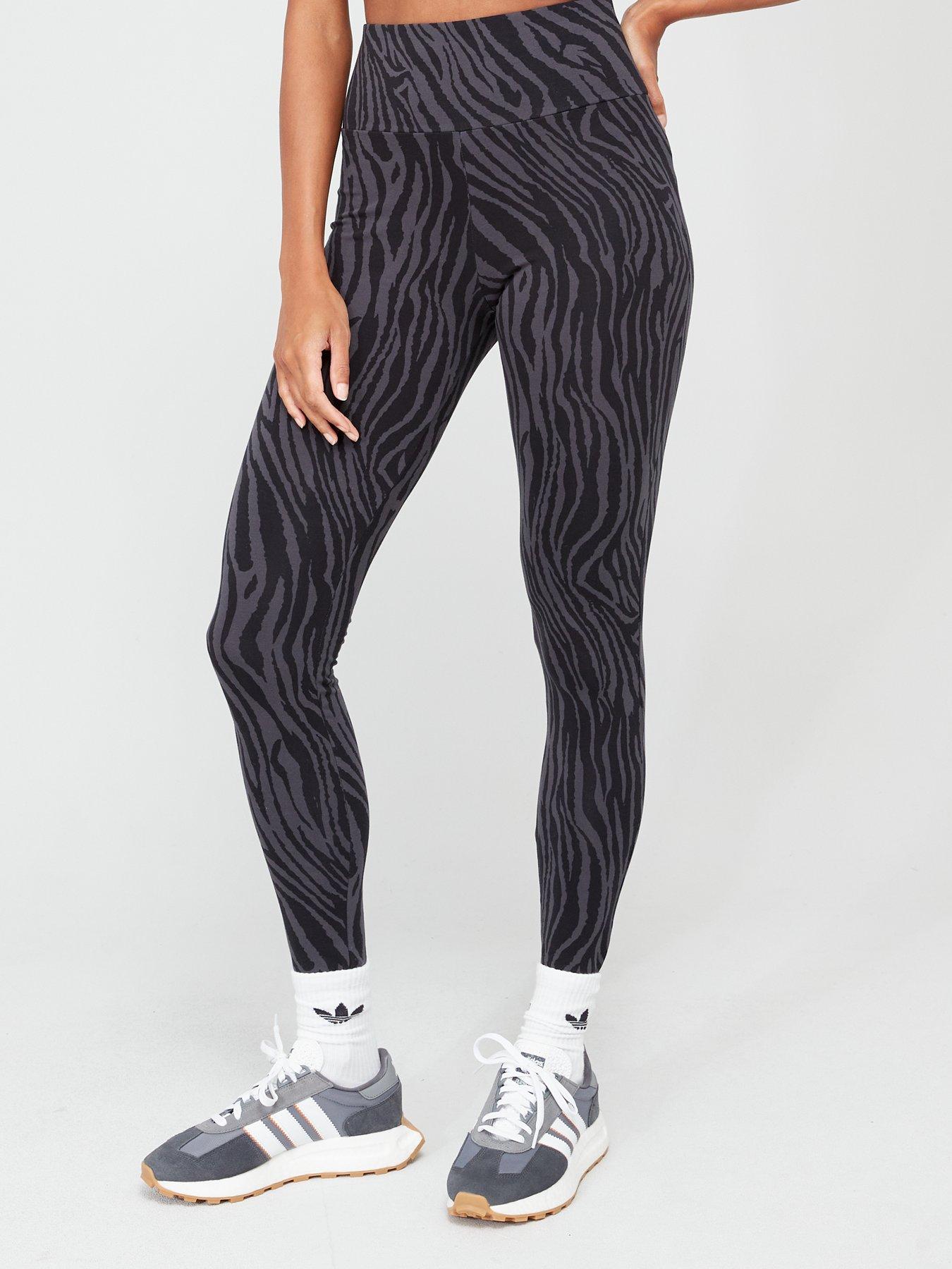 adidas Originals 'animal abstract' leggings in black with zebra print