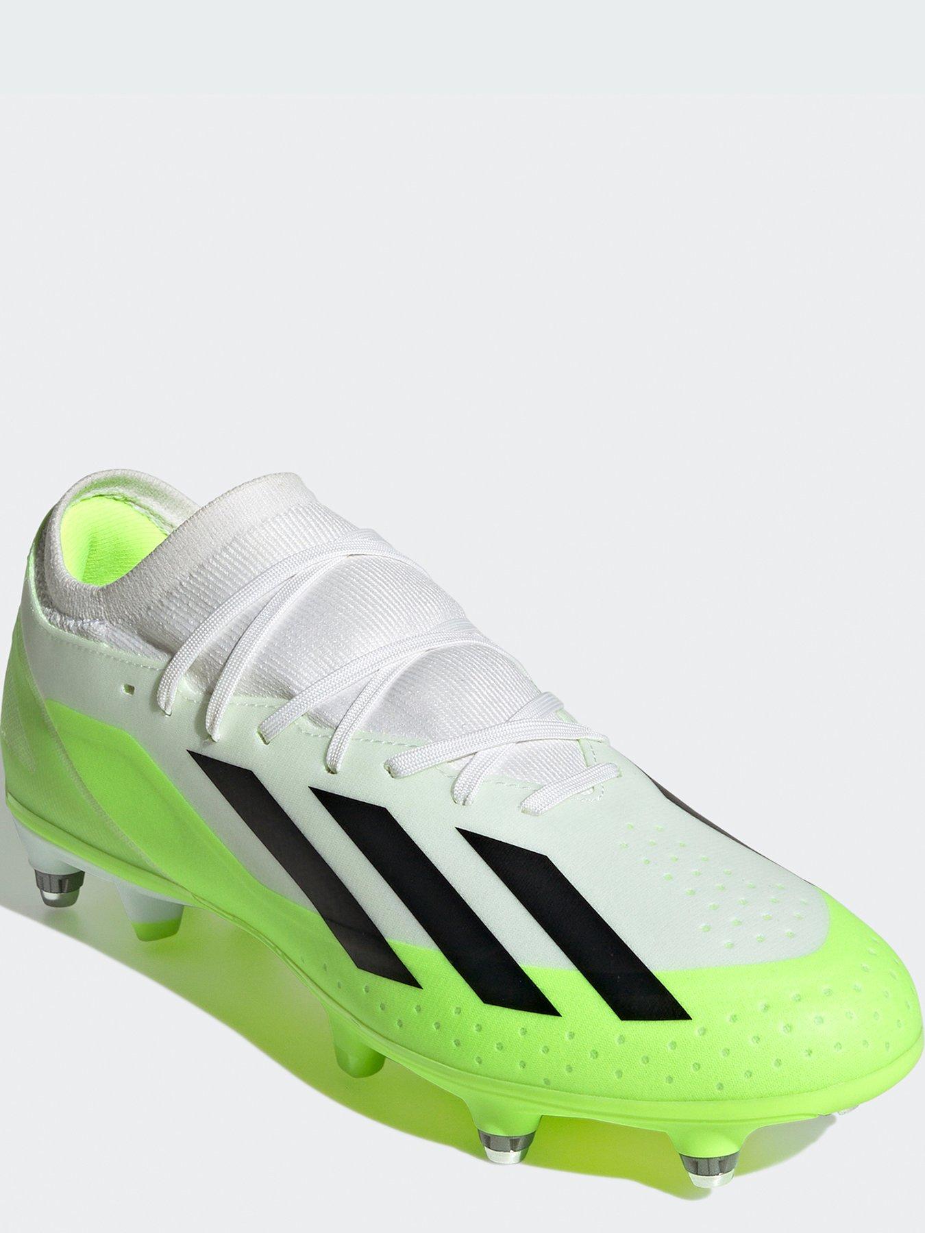 White and green hot sale football boots