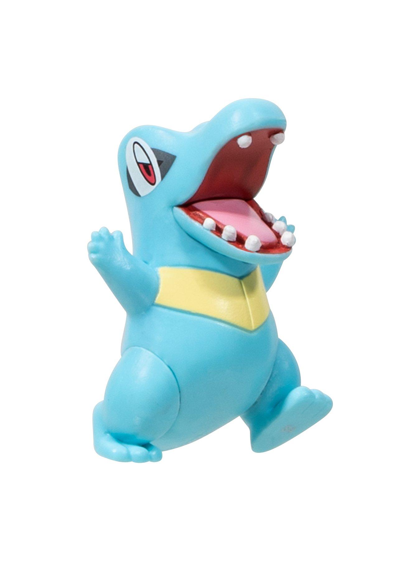 pokemon-surprise-attack-game-2-inch-axew-with-poke-ball-and-2-inch-totodile-with-net-ball-plus-six-attack-discsoutfit