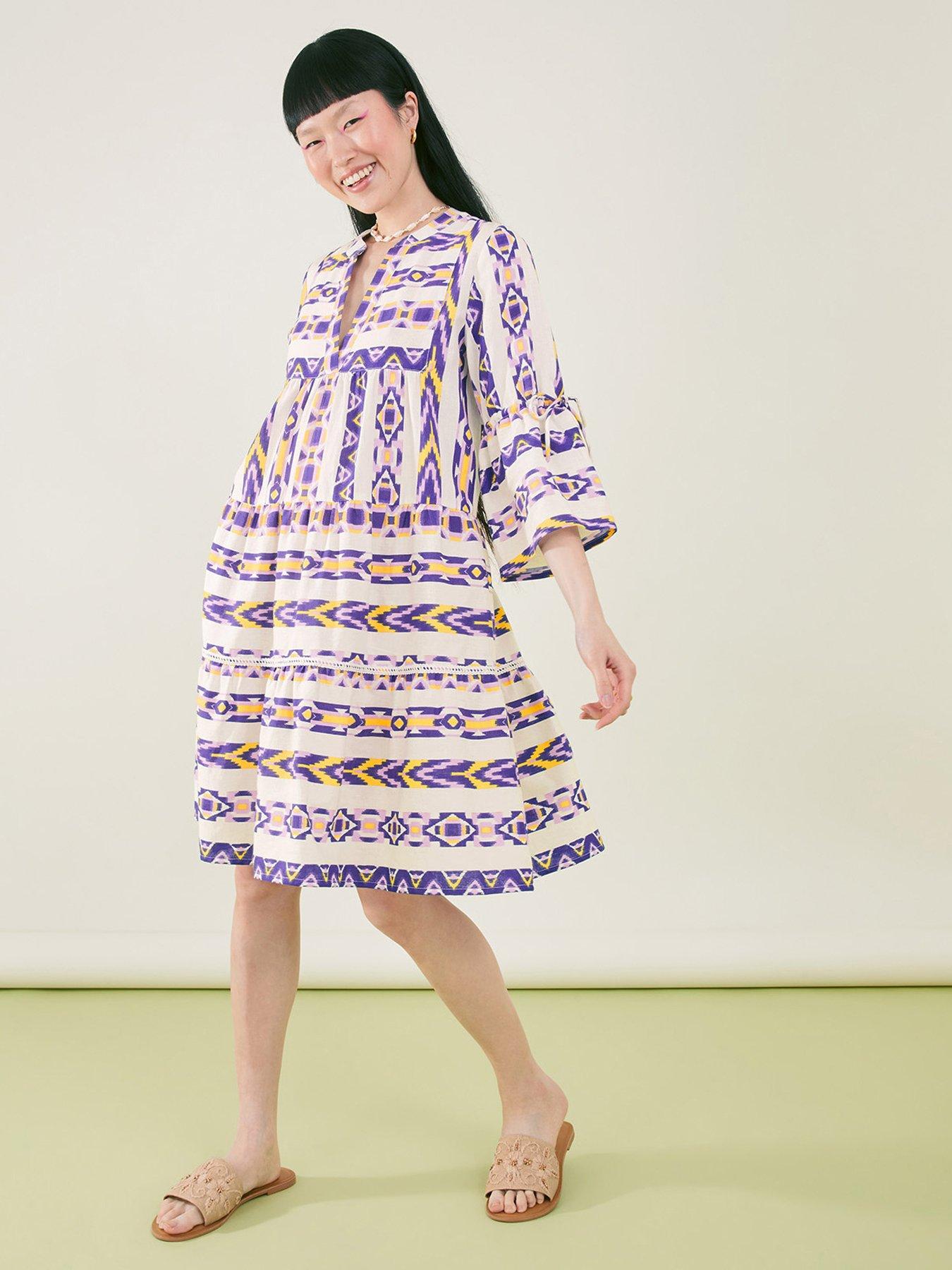 Image 1 of 4 of Accessorize Printed Jacquard Flute Sleeve Dress - Multi