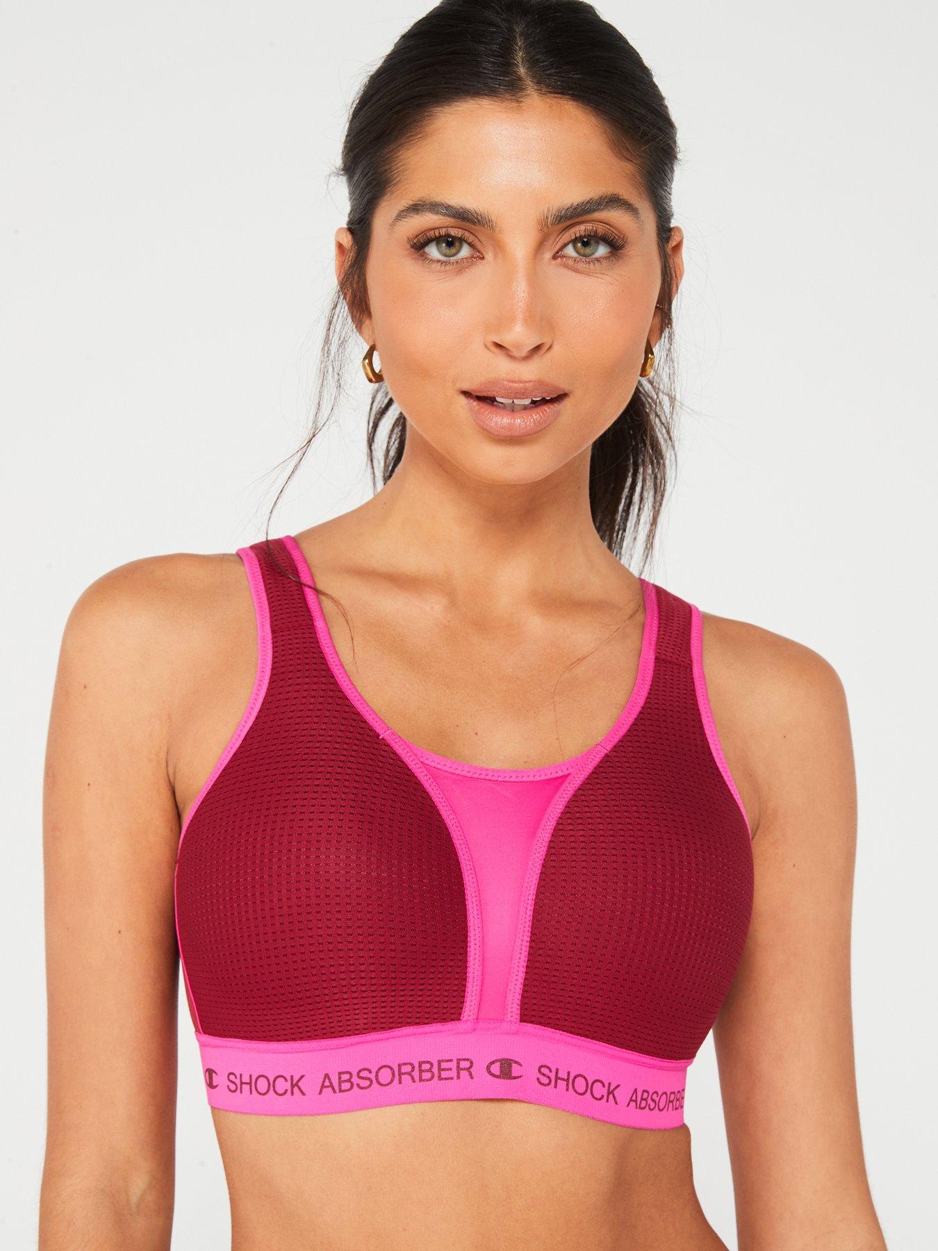 Shock Absorber Ultimate run sports bra in pink with yellow detail