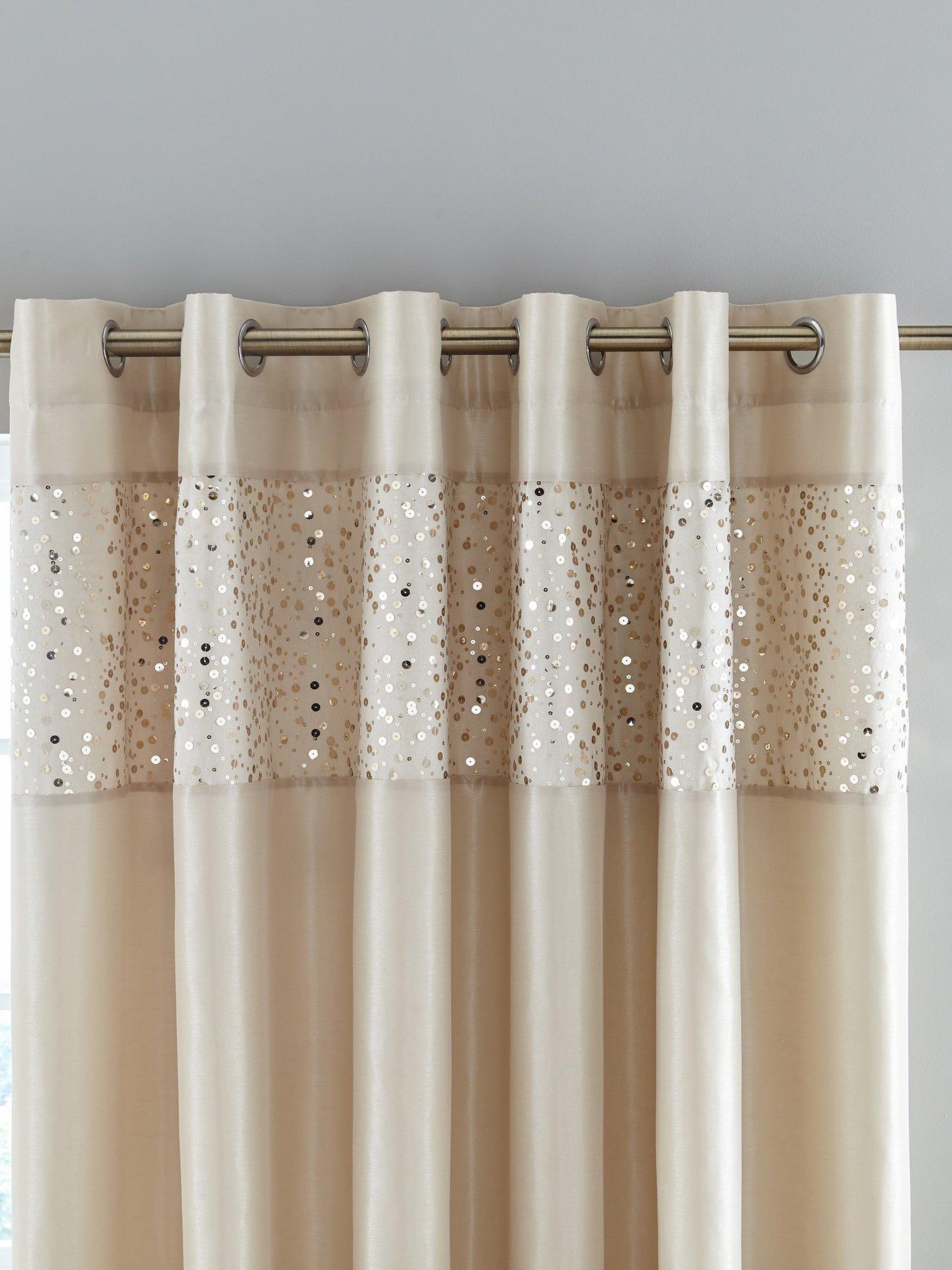 catherine-lansfield-glitzy-sequin-lined-eyelet-curtainsback