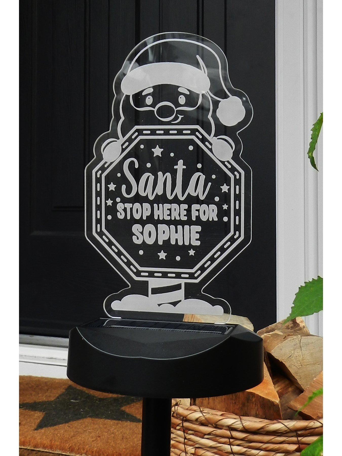 the-personalised-memento-company-personalised-outdoor-solar-santa-stop-here-lightstillFront