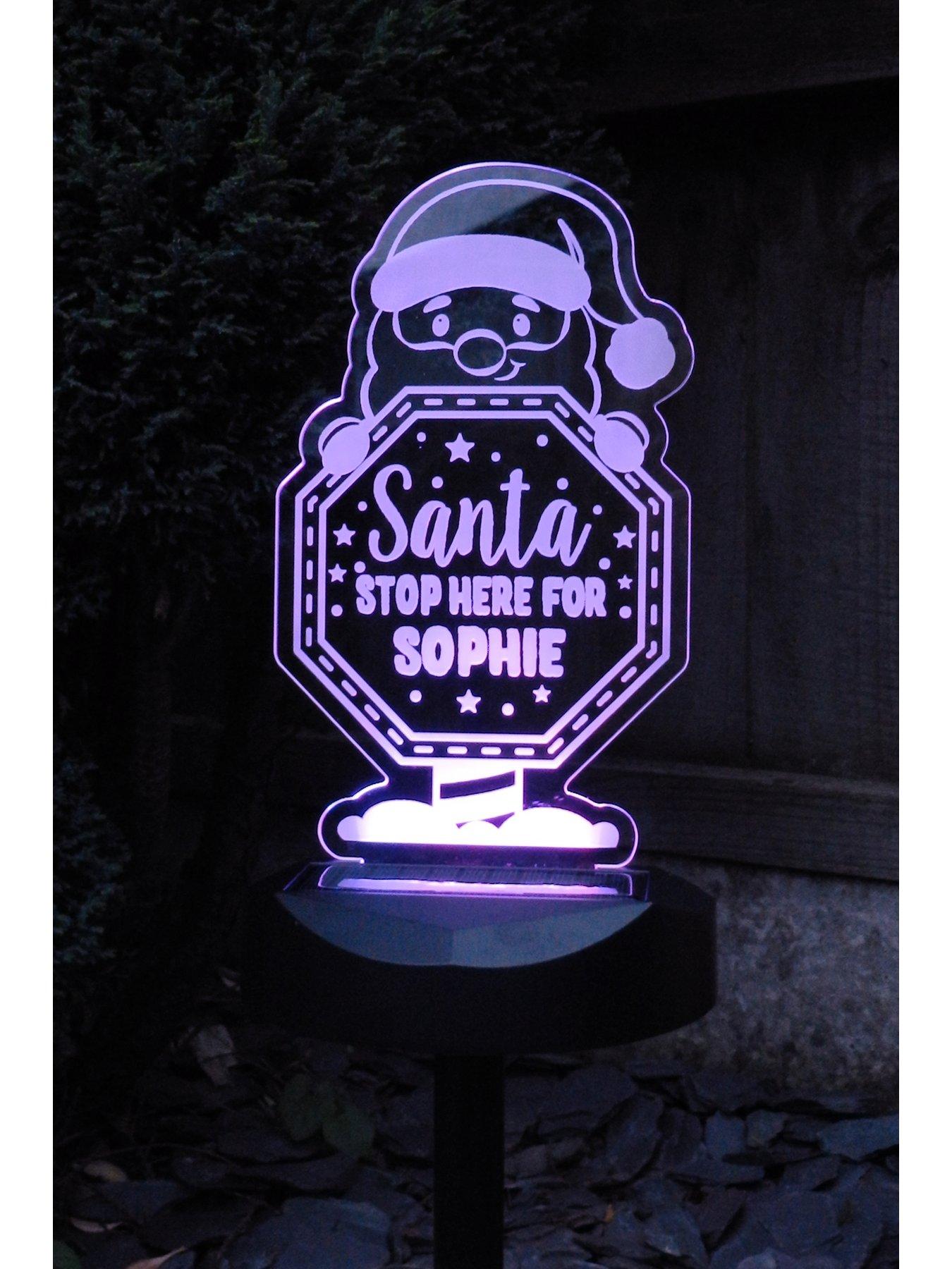 the-personalised-memento-company-personalised-outdoor-solar-santa-stop-here-lightback