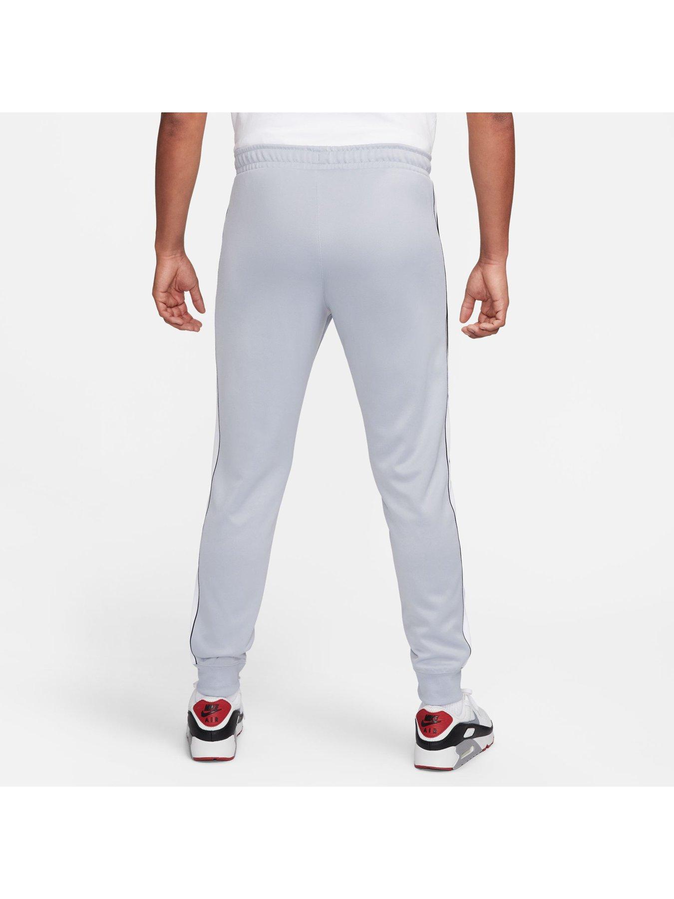 Nike swoosh taped joggers hotsell