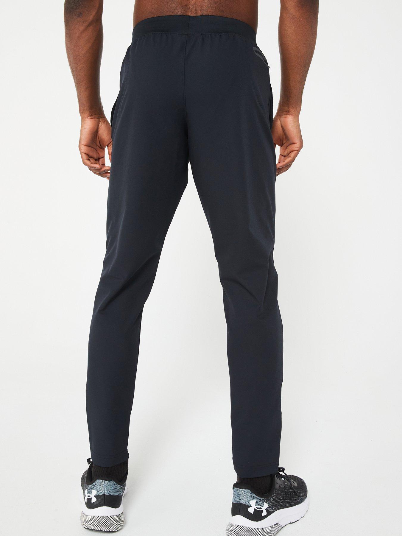 UNDER ARMOUR Tapered Workout Pants in Dark Grey