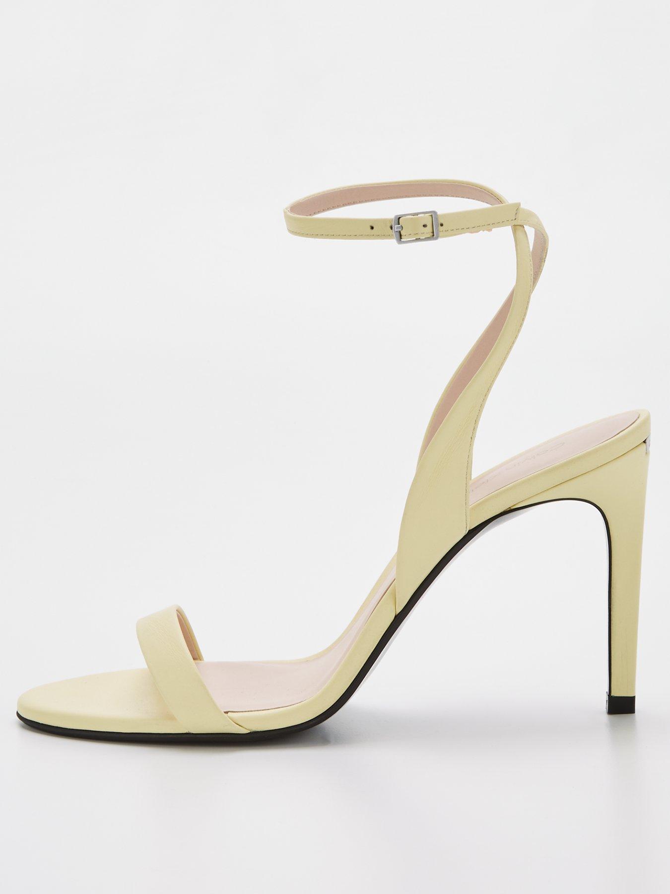 calvin-klein-heeled-sandal-yellow