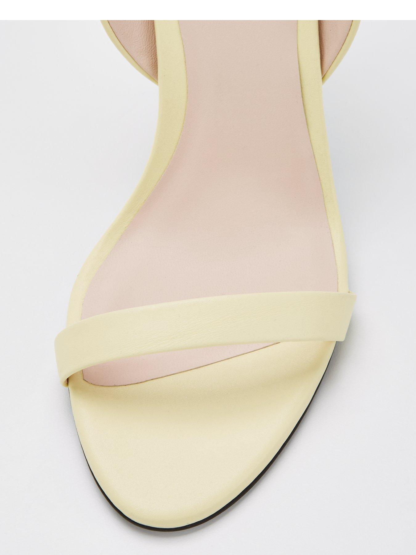 calvin-klein-heeled-sandal-yellowoutfit