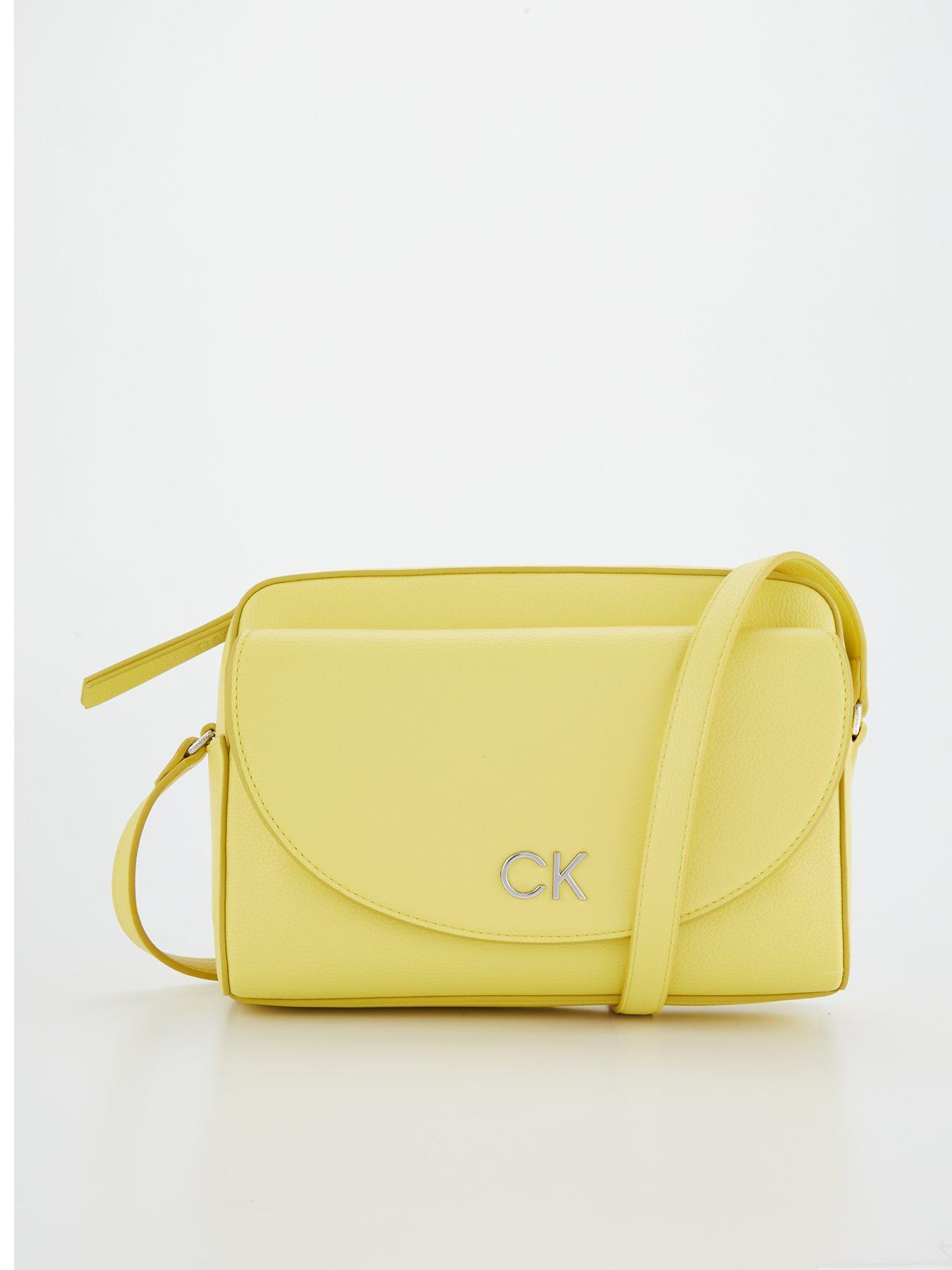 calvin-klein-camera-bag-yellow