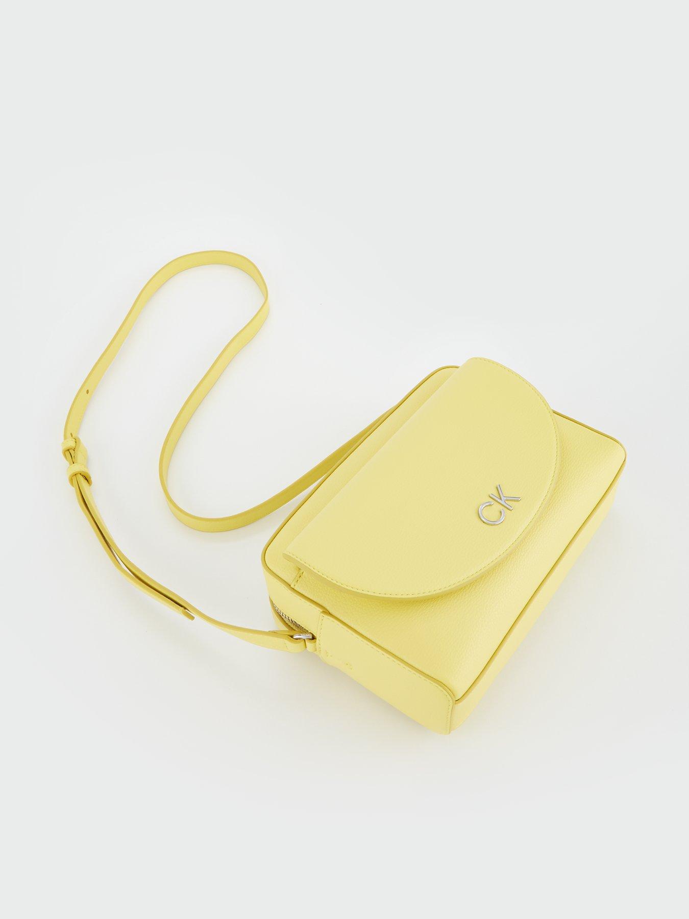 calvin-klein-camera-bag-yellowback