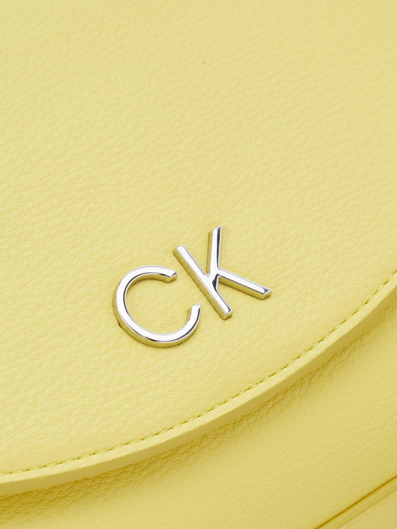 calvin-klein-camera-bag-yellowoutfit