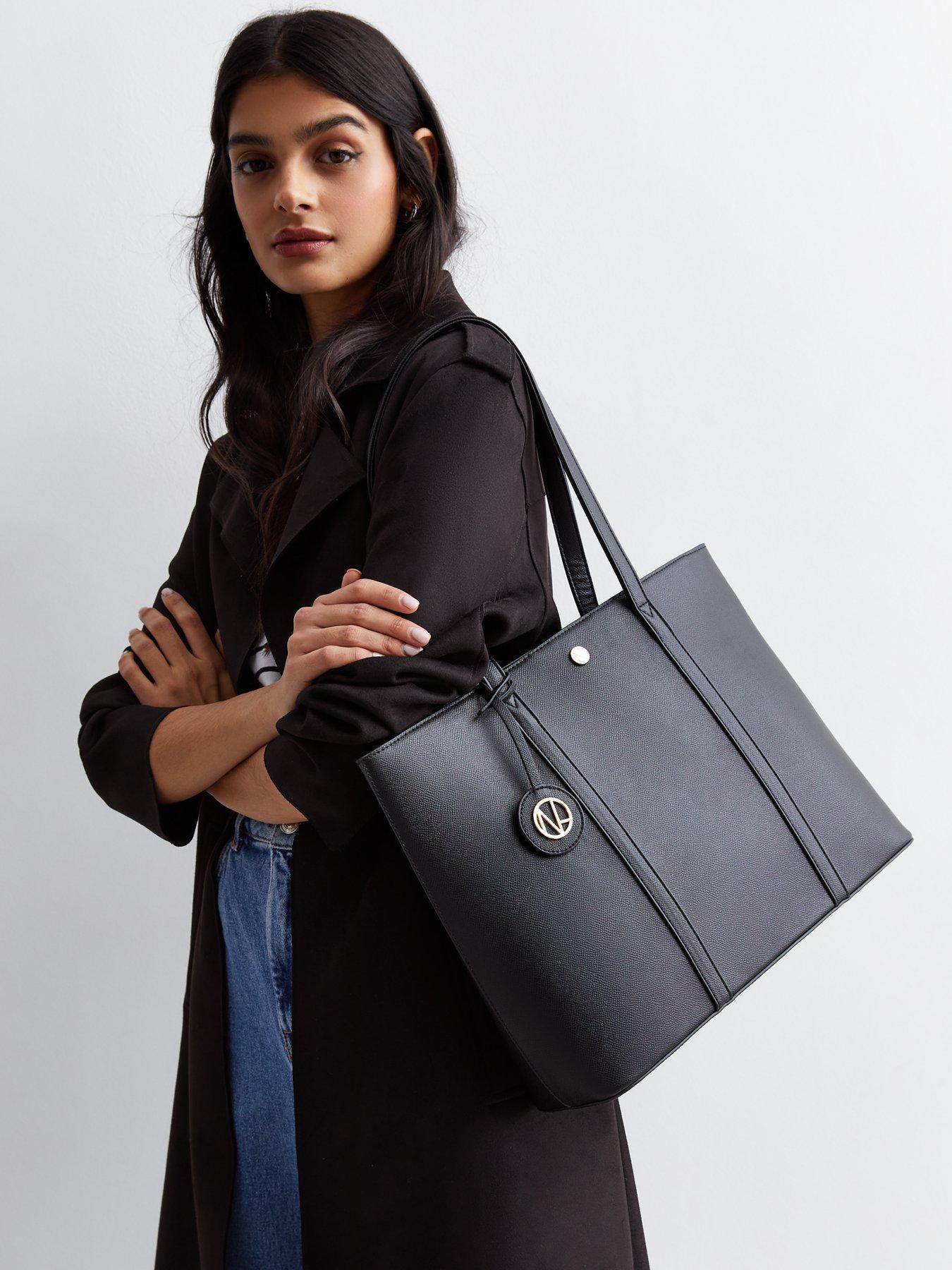 Black leather outlet look tote bag