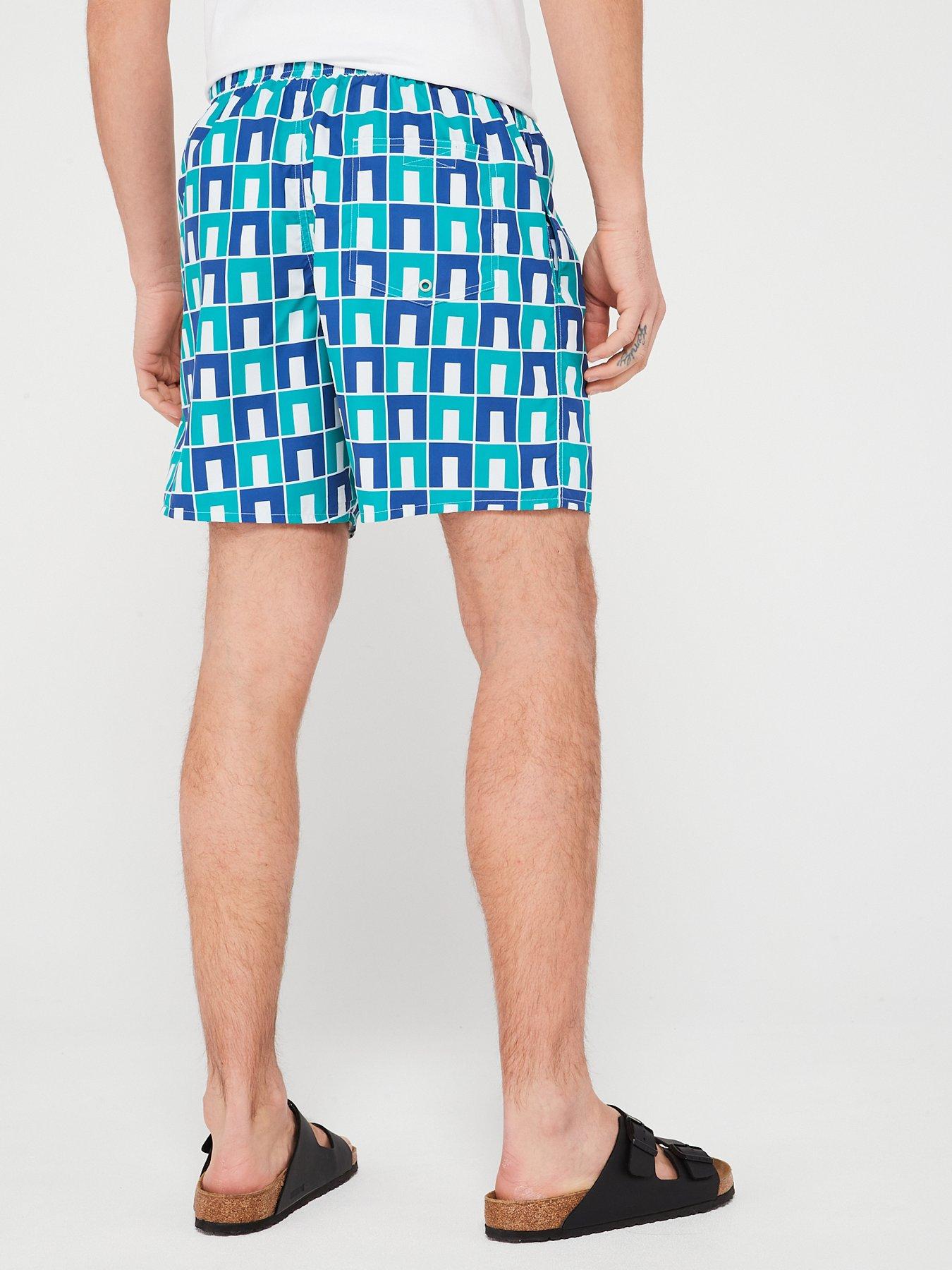 lacoste-lacoste-robert-george-blue-archive-print-co-ord-swim-shorts-greenstillFront